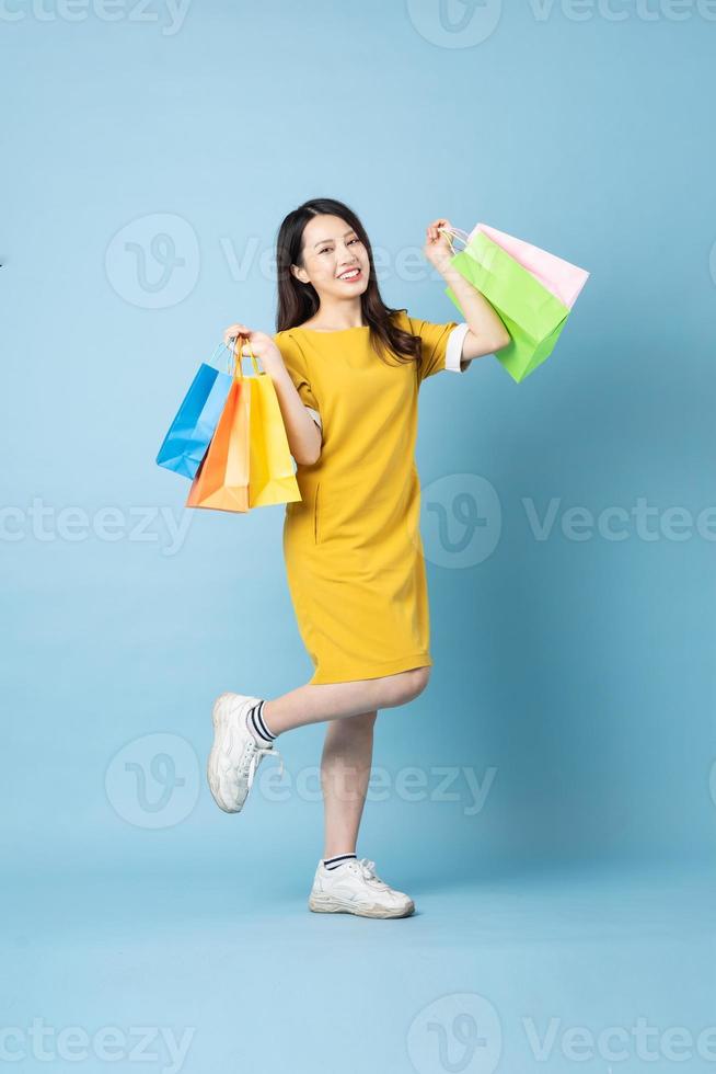 Asian woman portrait in need of a shopping bag photo