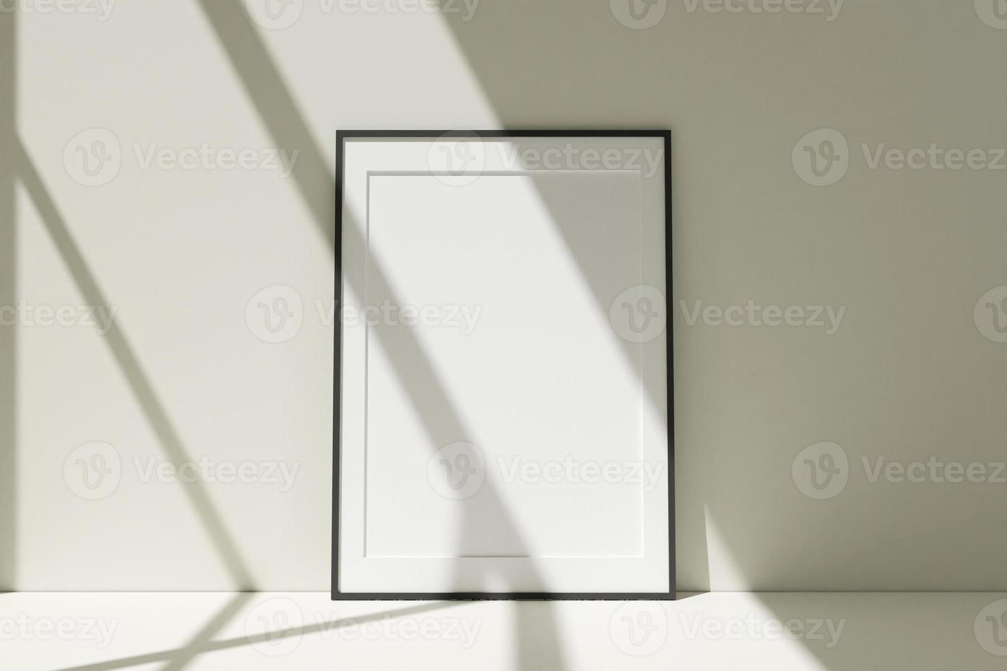 Vertical black photo frames mockup on the floor leaning against the room wall with shadow