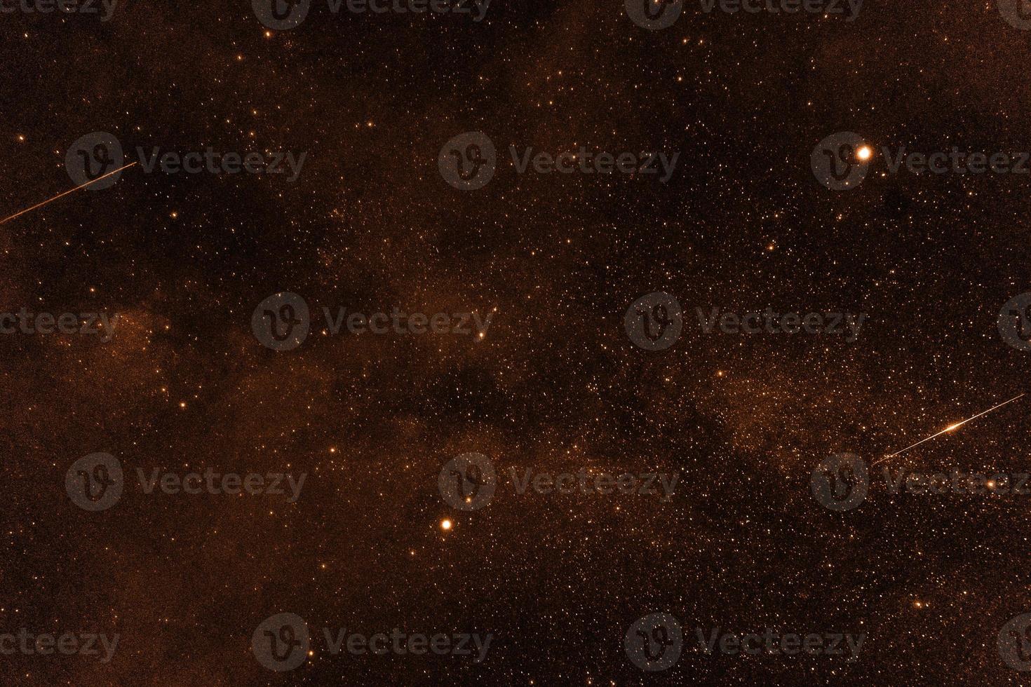 Naranja espectacular panorama nocturno de galaxias desde el espacio del universo lunar en el cielo nocturno foto