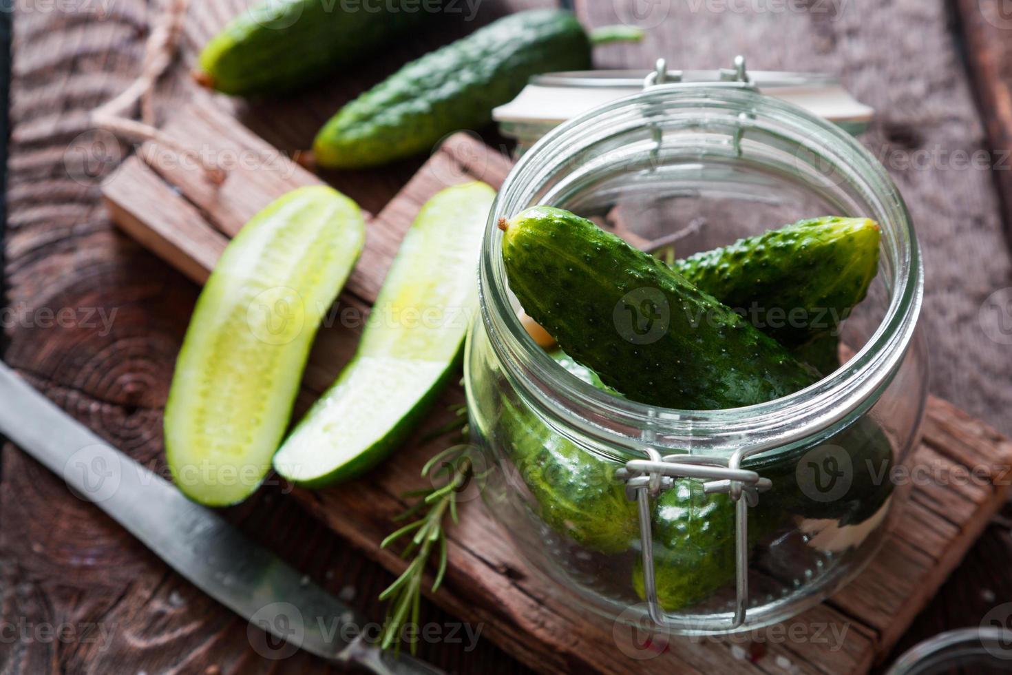 green cut cucumber fruit pattern natural fruit with clipping path on wood. photo