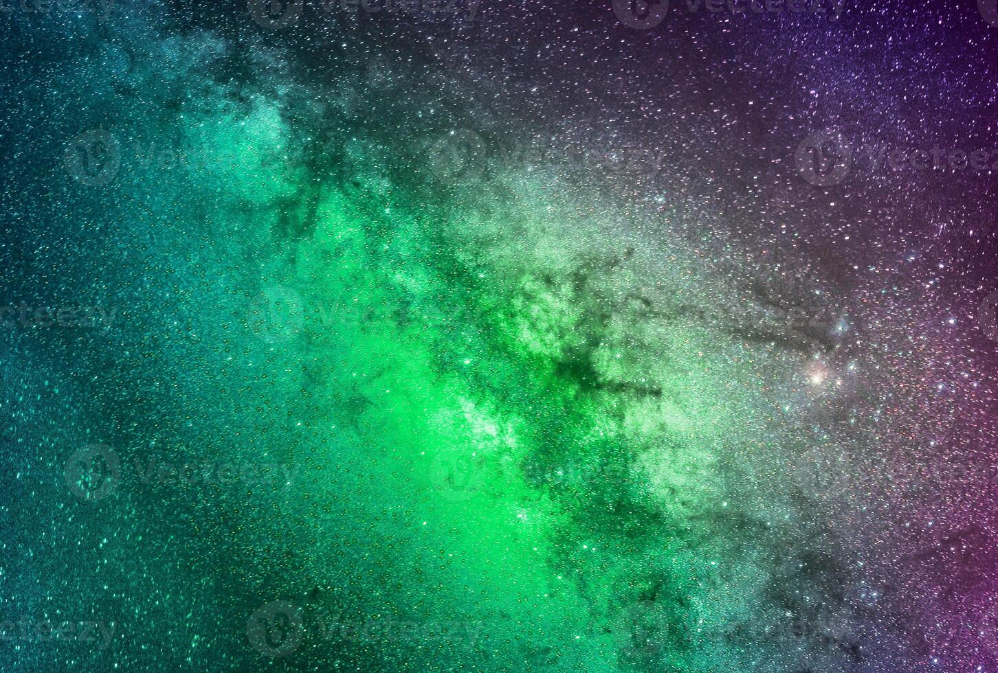 Fondo de galaxias abstractas con estrellas y planetas con motivos de galaxias verdes del universo espacial de luz nocturna foto