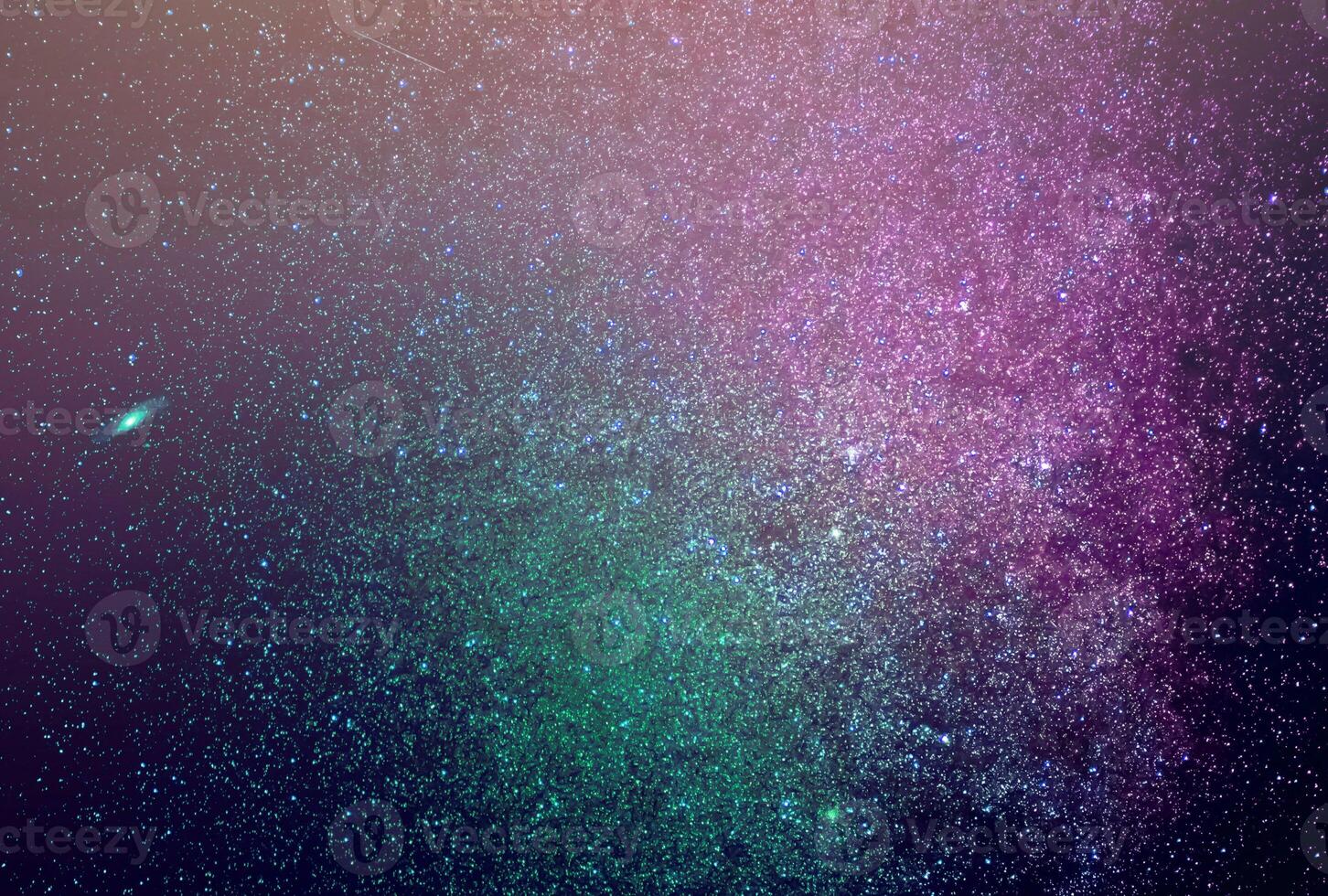 abstract galaxy background with stars and planets with green galaxy motifs and pink night light universe photo