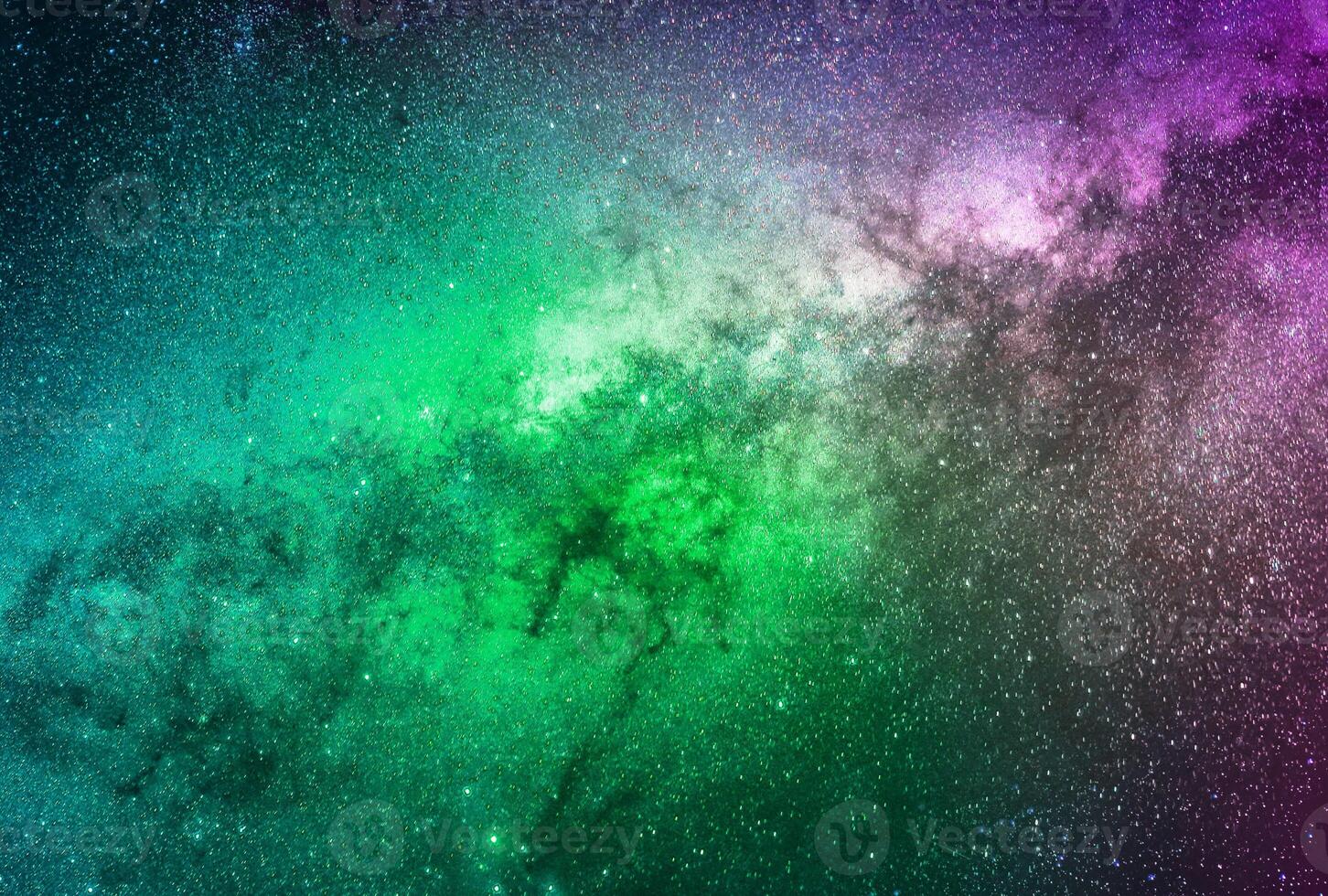 Fondo de galaxias abstractas con estrellas y planetas con motivos de galaxias en el espacio verde y morado del universo de luz nocturna foto