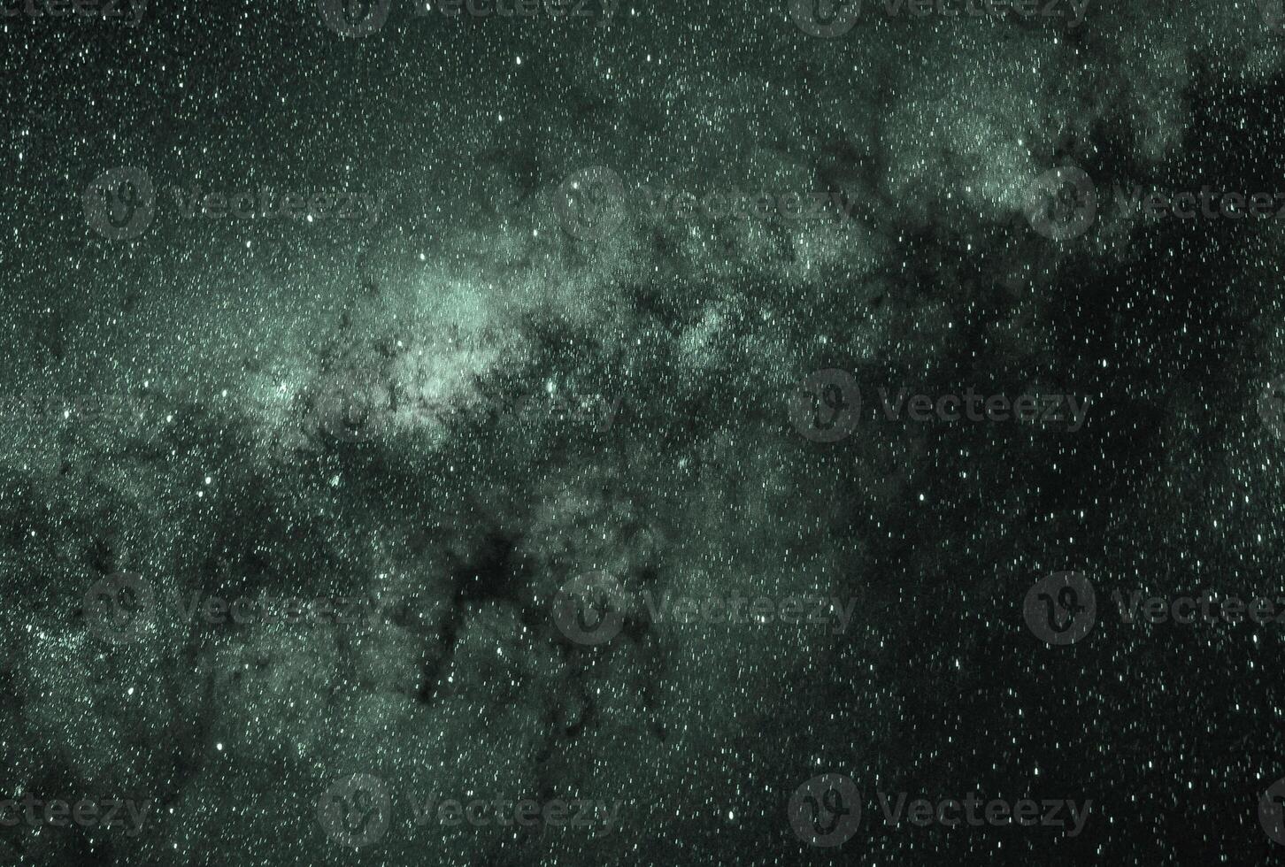 Fondo de galaxias abstractas con estrellas y planetas con motivos de galaxias en el espacio negro y verde del universo de luz nocturna foto