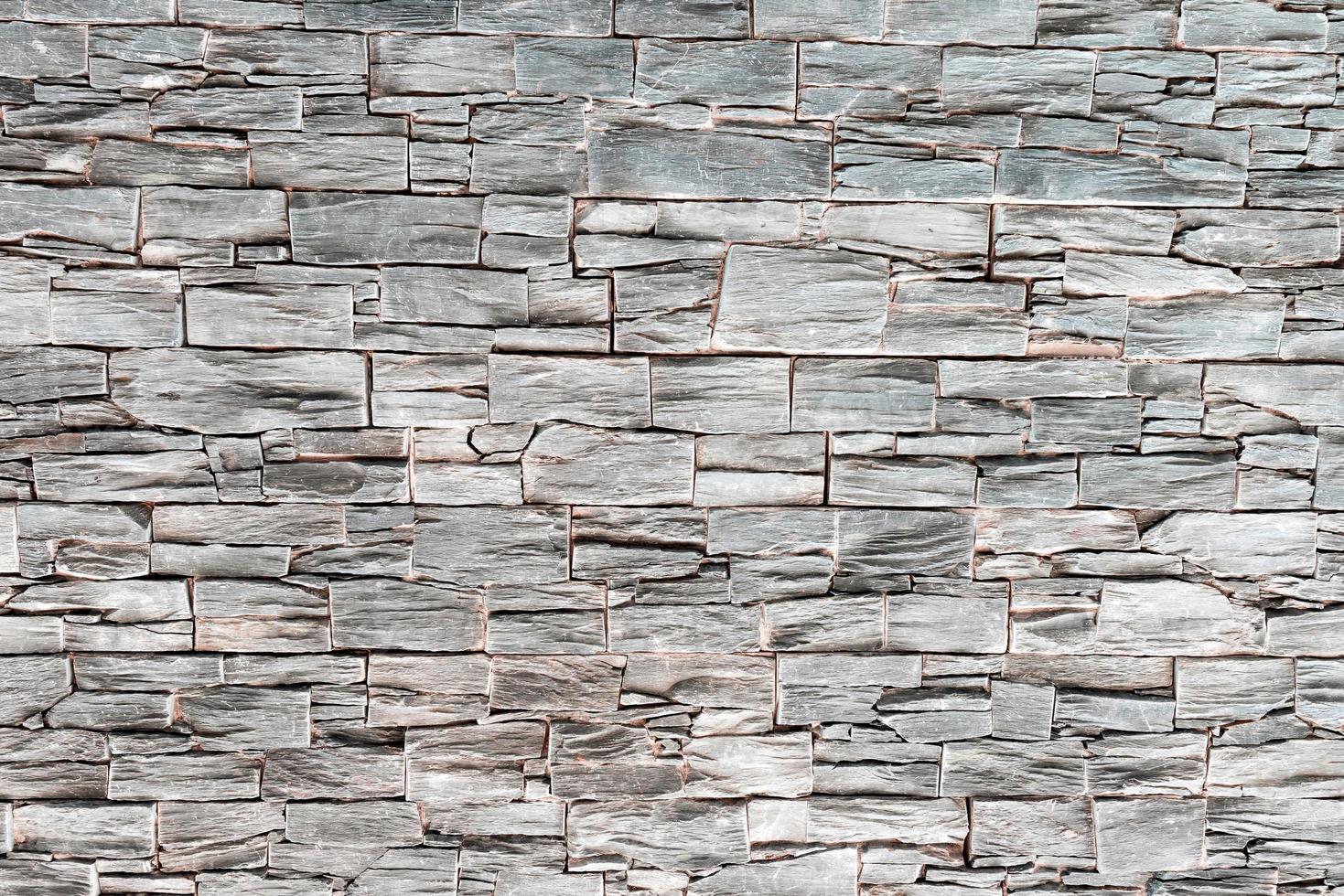 Fondo de piedra, azulejo de roca con color gris y negro, textura de patrón, material abstracto para papel tapiz foto