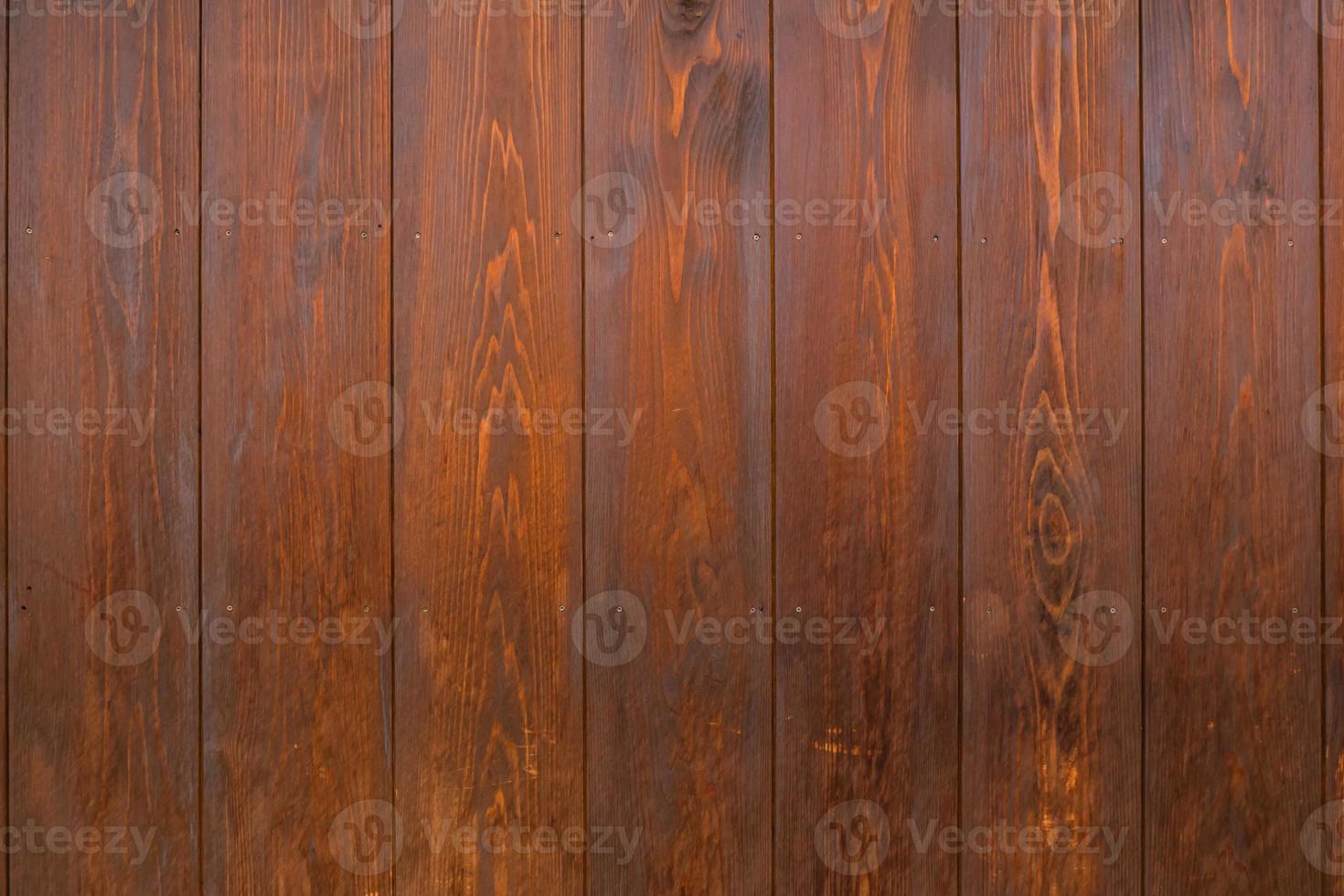 brown wooden plank texture surface with old natural pattern on brown wood. photo