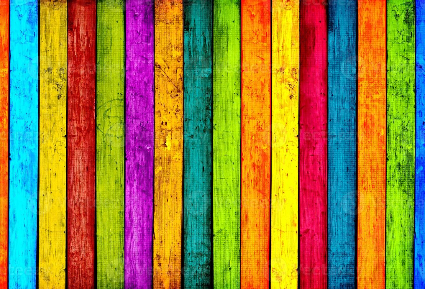 Superficie de textura de tablón de madera de color arco iris con patrón natural antiguo en madera. foto