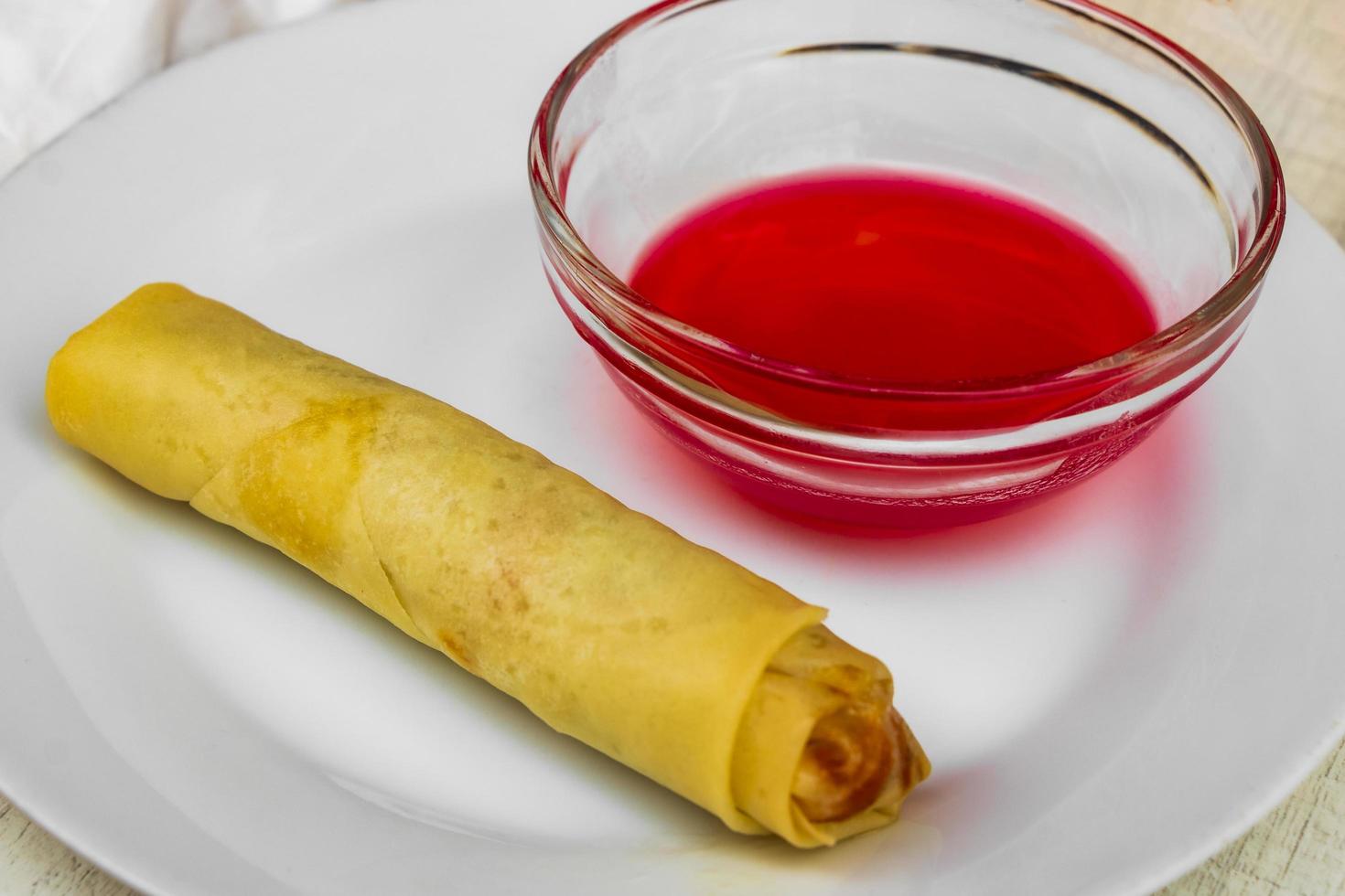 Spring roll with pink red sauce. Food on Mallorca. photo