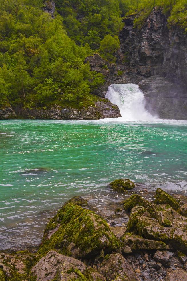 Beautiful Holjafossen waterfall turquoise water Utladalen Norway most beautiful landscapes. photo