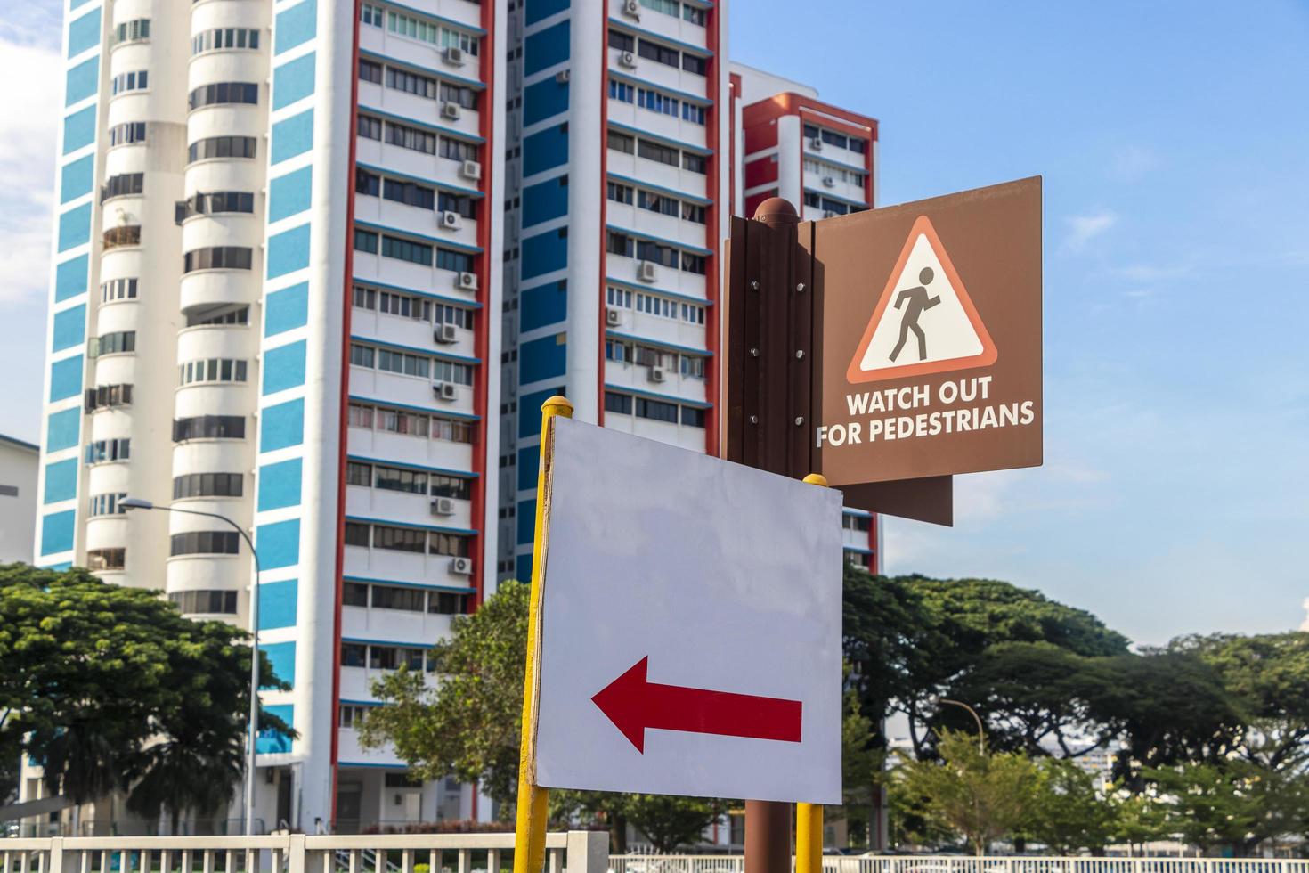 Empty white and brown street signs and information signs, Singapore. photo