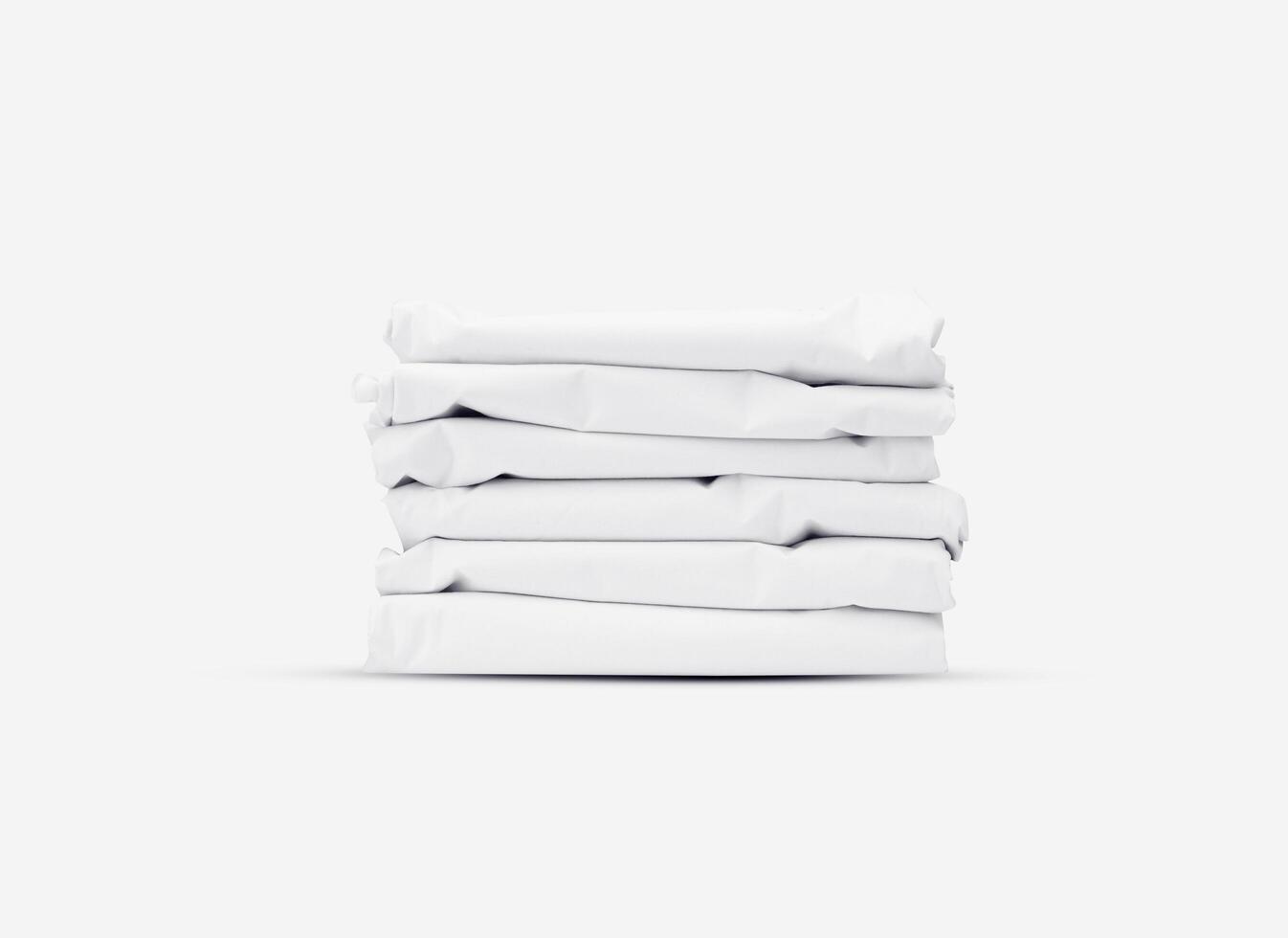 a pile of folded white fabrics. well designed white fabric cloth concept. textile texture mockup for creative design preview. photo