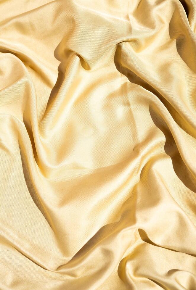 wavy textile rippled from top point of view. luxurious material for exclusive background use. creative decoration element. photo