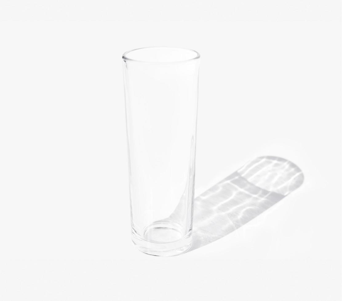 minimalist photography of a transparent glass cup positioned in the abstract. a minimal concept for wall art, print, and interior decoration. photo