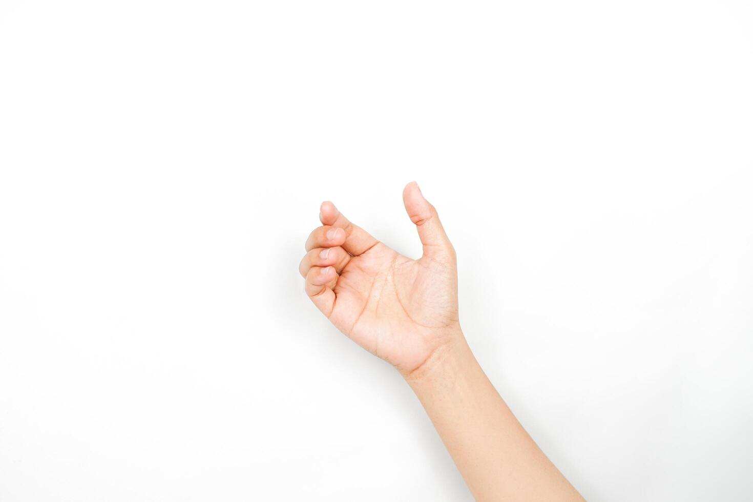 a hand acts like it's holding something. a collection of hand gestures isolated on a white background. photo