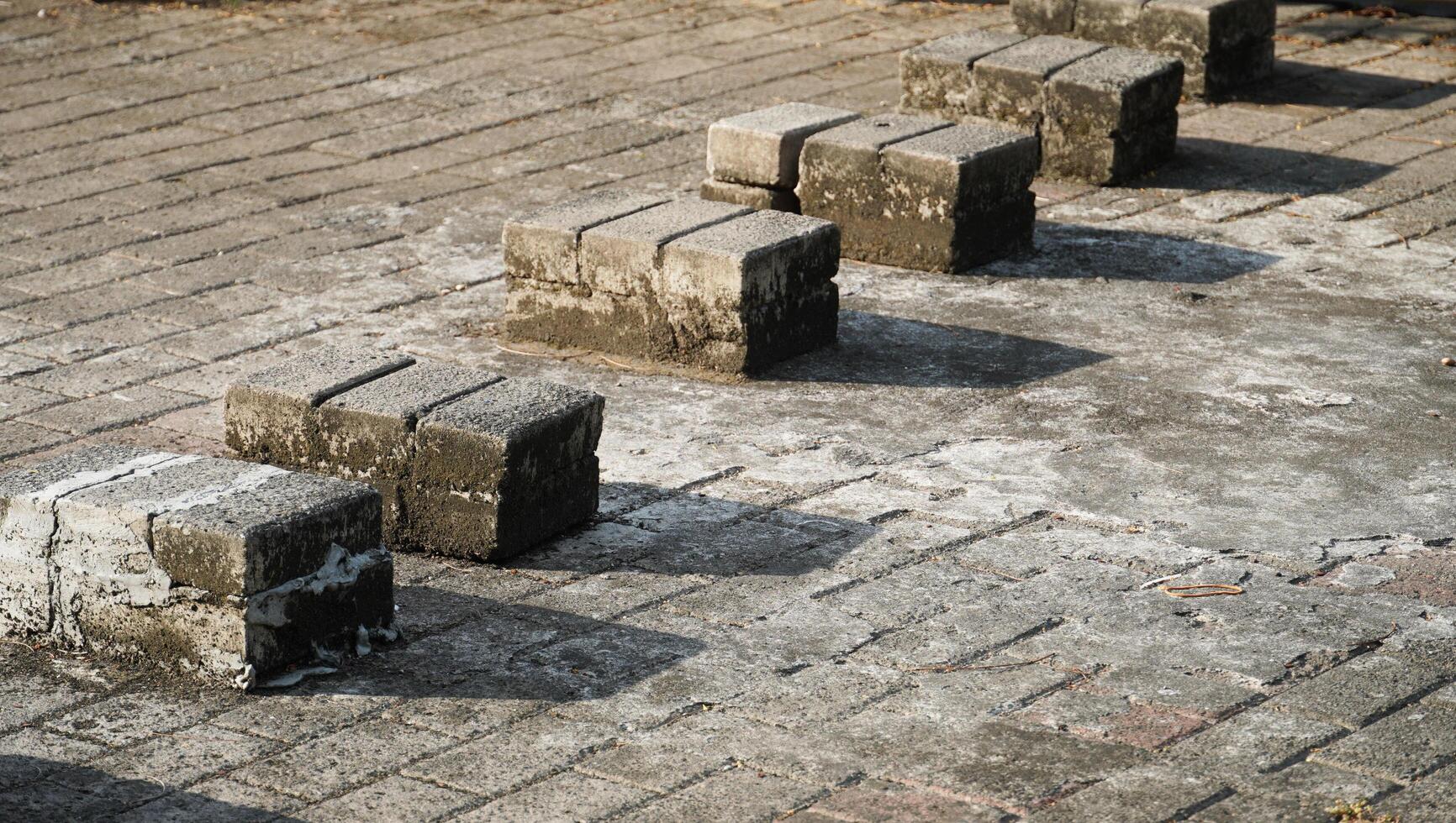 the pavement of the pedestrian has some embossed parts. the uneven surface of the pedestrian in a public area. photo