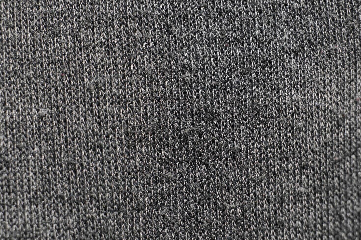 the abstract surface of furry woven fabric in grey for a background pattern. photo