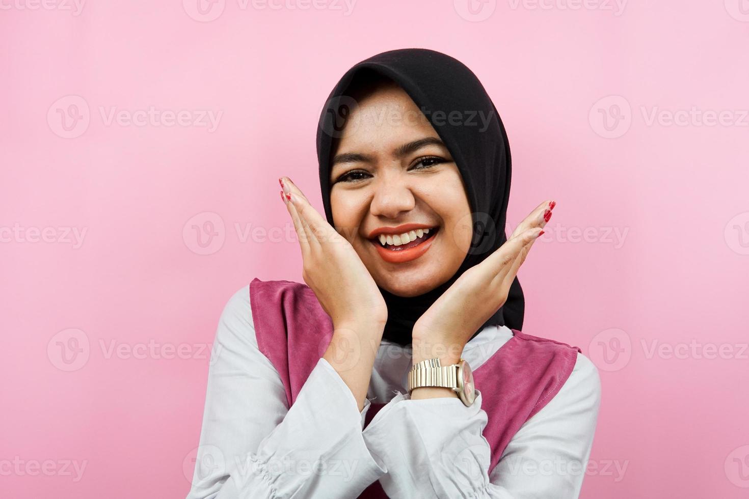 Closeup of cheerful beautiful young muslim woman isolated photo