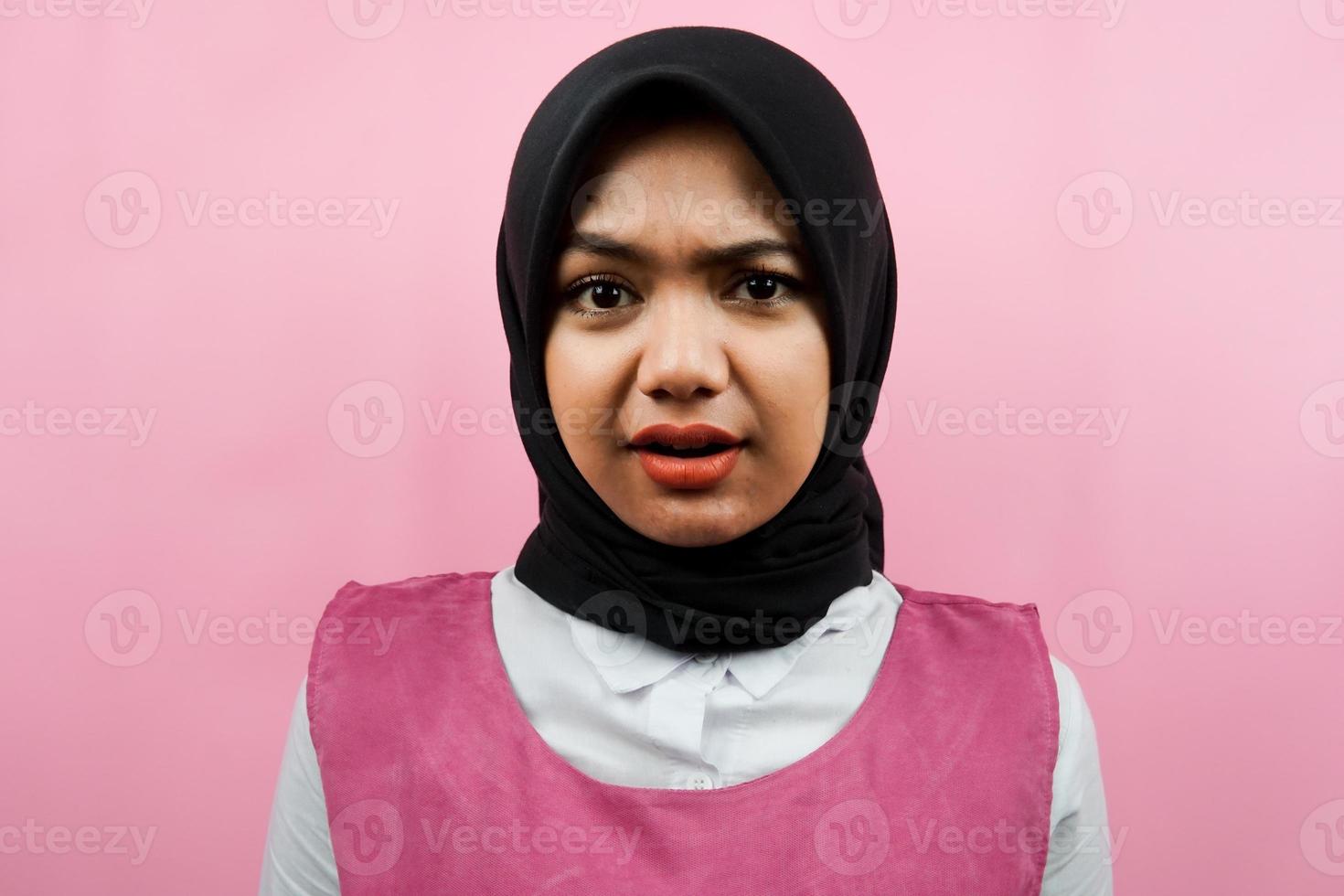 Close-up of beautiful surprised muslim young woman isolated photo