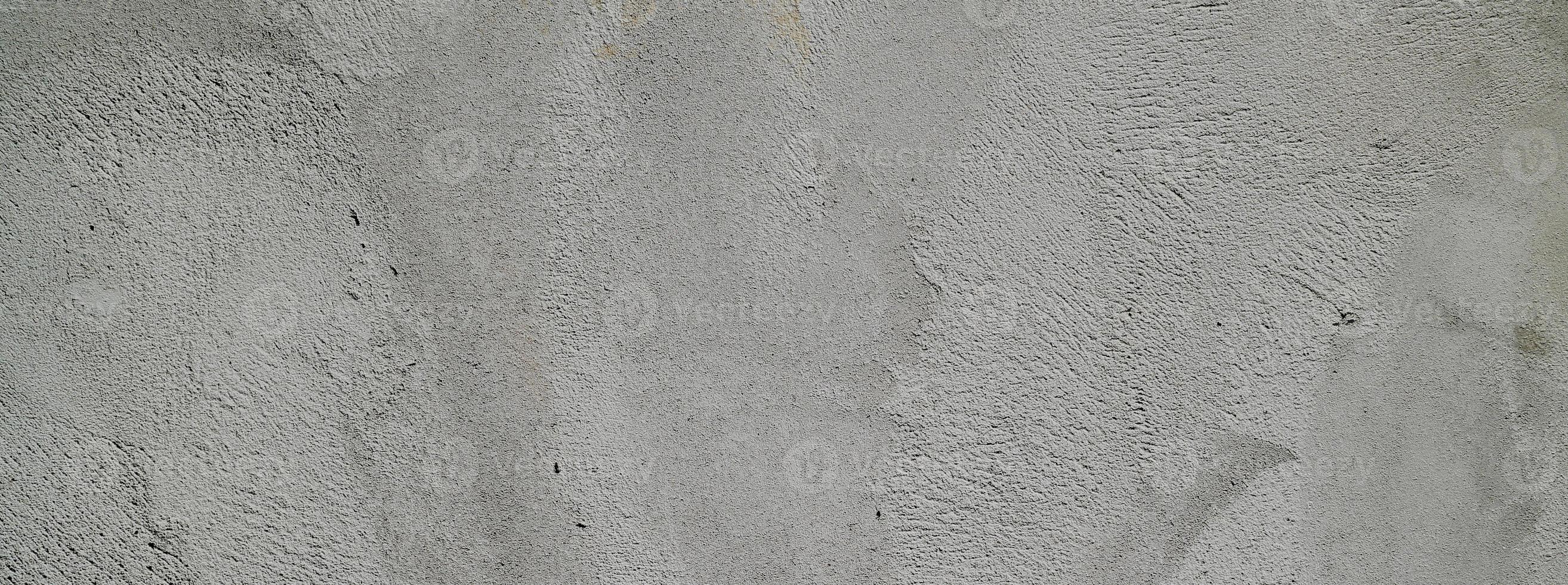 yeso de cemento gris. textura de la pared para el fondo. cepillar arañazos en la pared foto