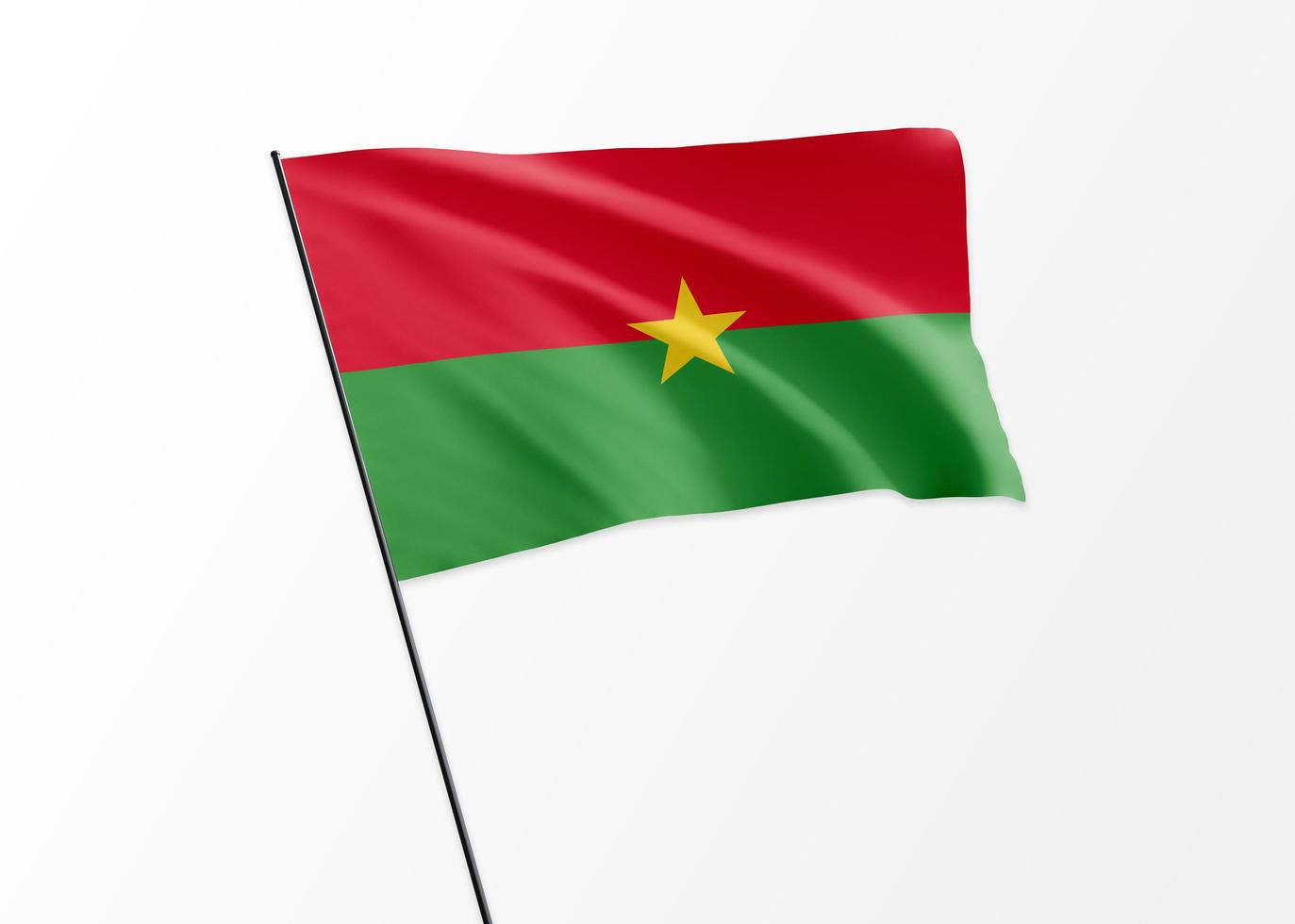 bandera de burkina faso ondeando alto en el fondo aislado día de la independencia de burkina faso. Ilustración 3d colección de la bandera nacional mundial foto