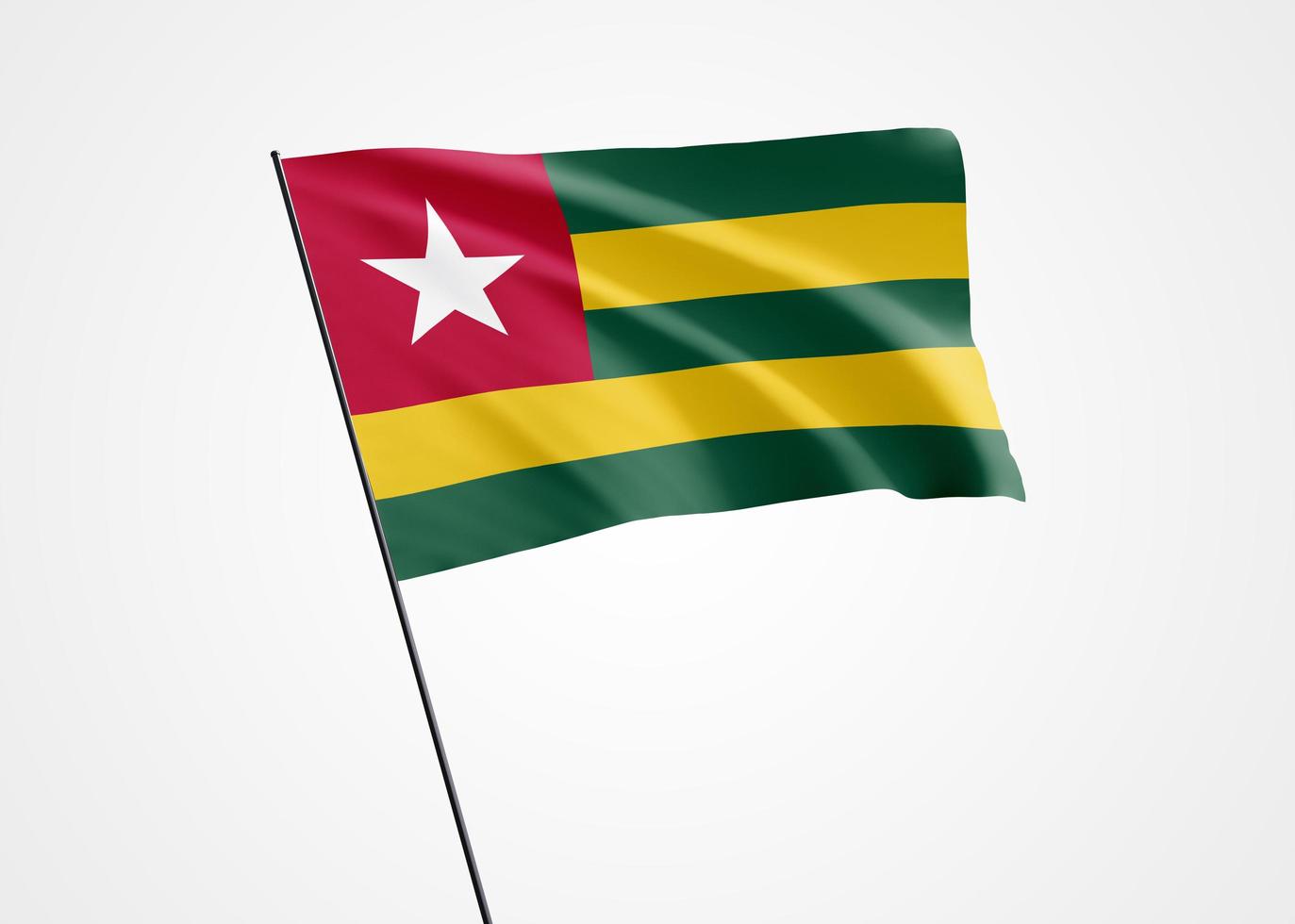 Togo flag flying high in the white isolated background. April 27 Togo independence day. World national flag collection world national flag collection photo
