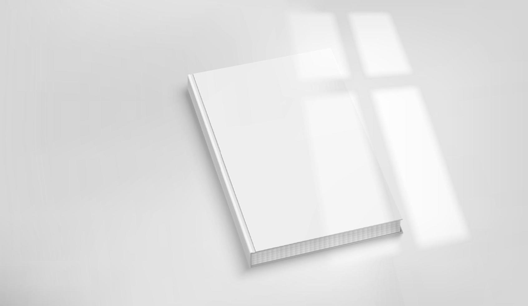 White book on a tabke with light of the window shadow overlay. Realistic vector mockup