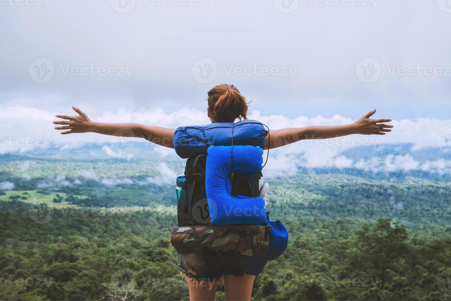 Asian women travel relax in the holiday. Standing on the mountain. Thailand photo