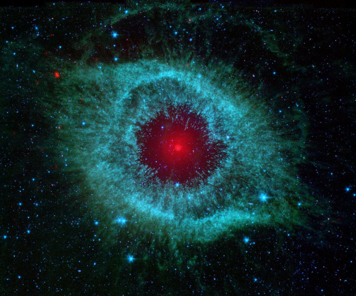 Comets Kick up Dust in Helix Nebula photo