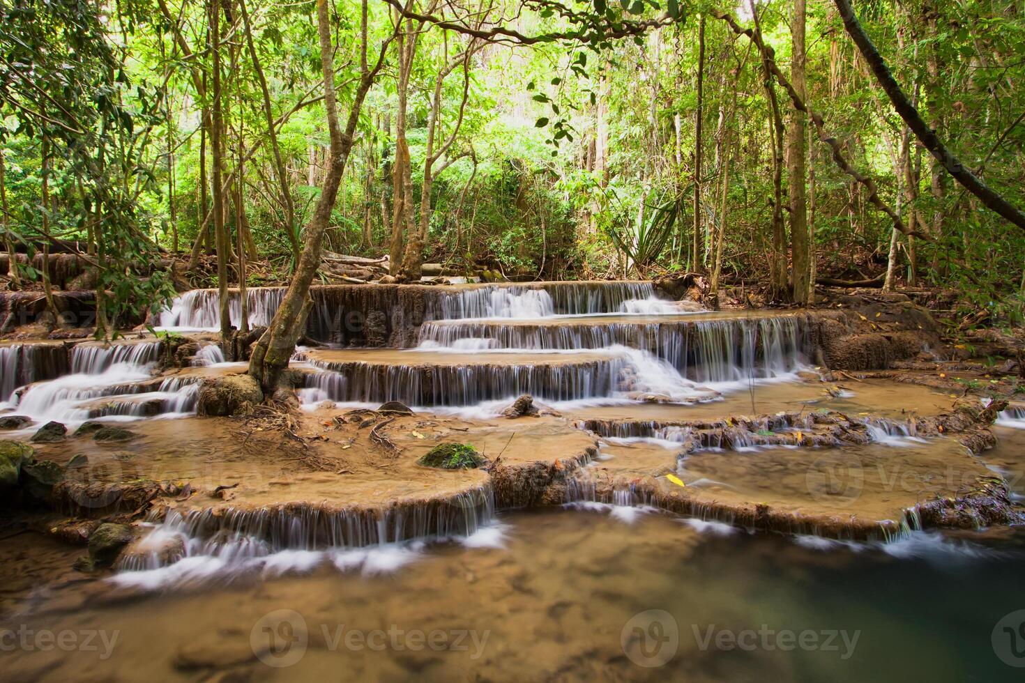 beautiful waterfall panoramic beautiful deep green natural forest on nature. photo