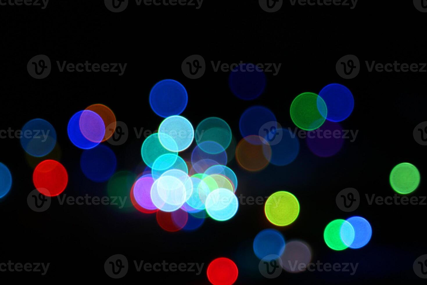 Abstract blur light background.Colorful decorating light.abstract light.Beautiful colorful blur on black photo