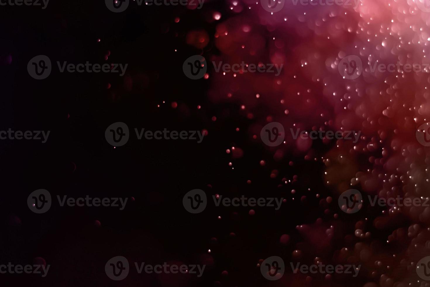 multicolored dark red blur Backdrop and circle background and Abstract circle blur Christmas lights effect photo