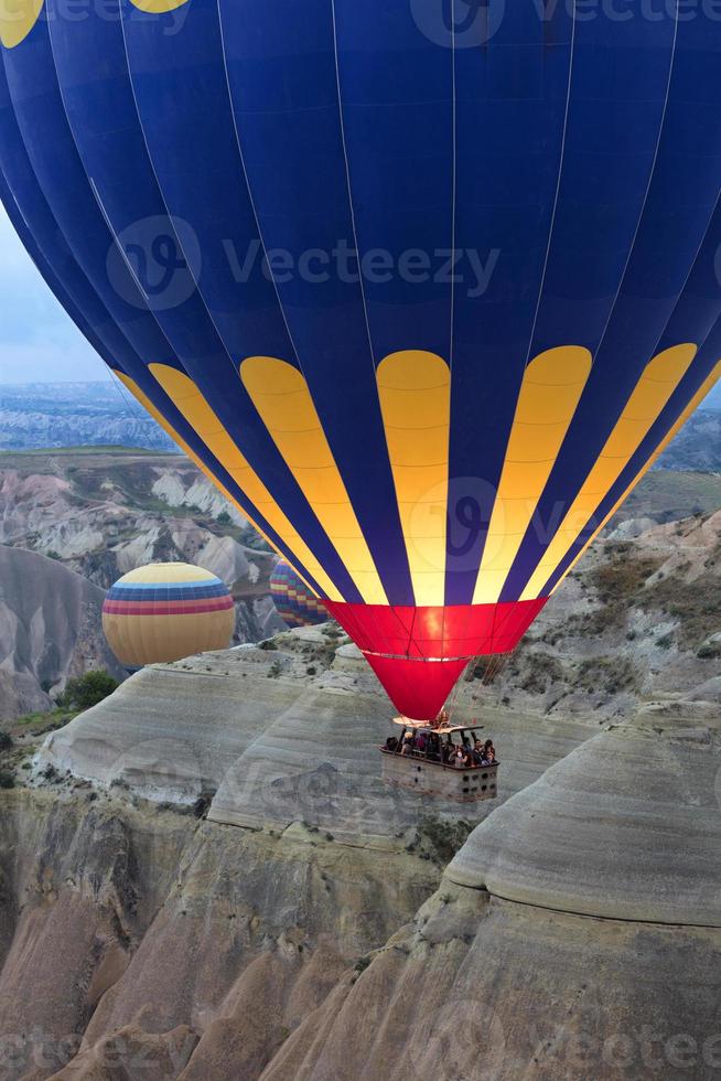A balloon is flying over the valley in Cappadocia. 12.05.2018. Turkey. photo