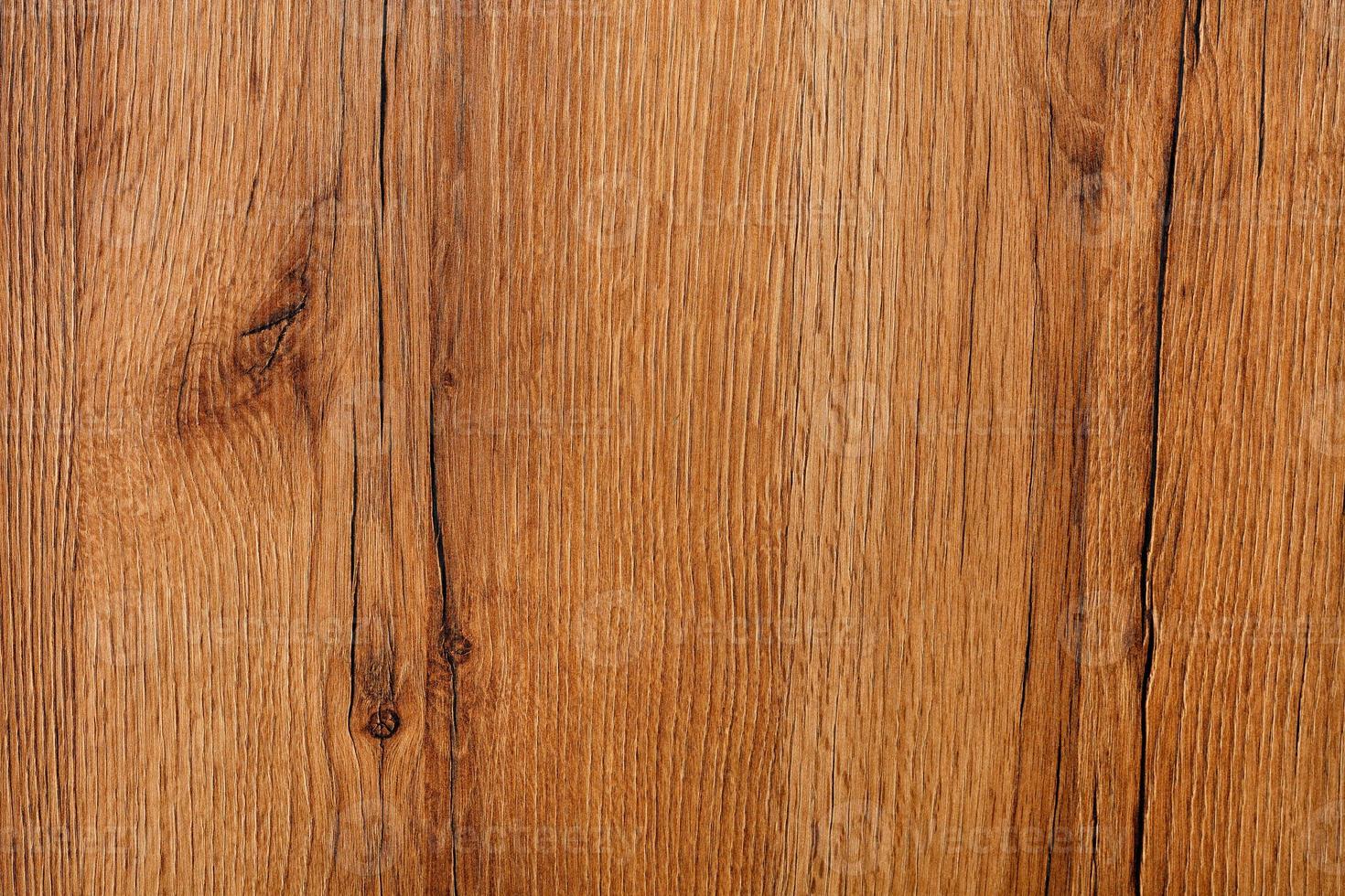 Beautiful texture of natural wood with cracks and a vertical pattern of fibers. photo