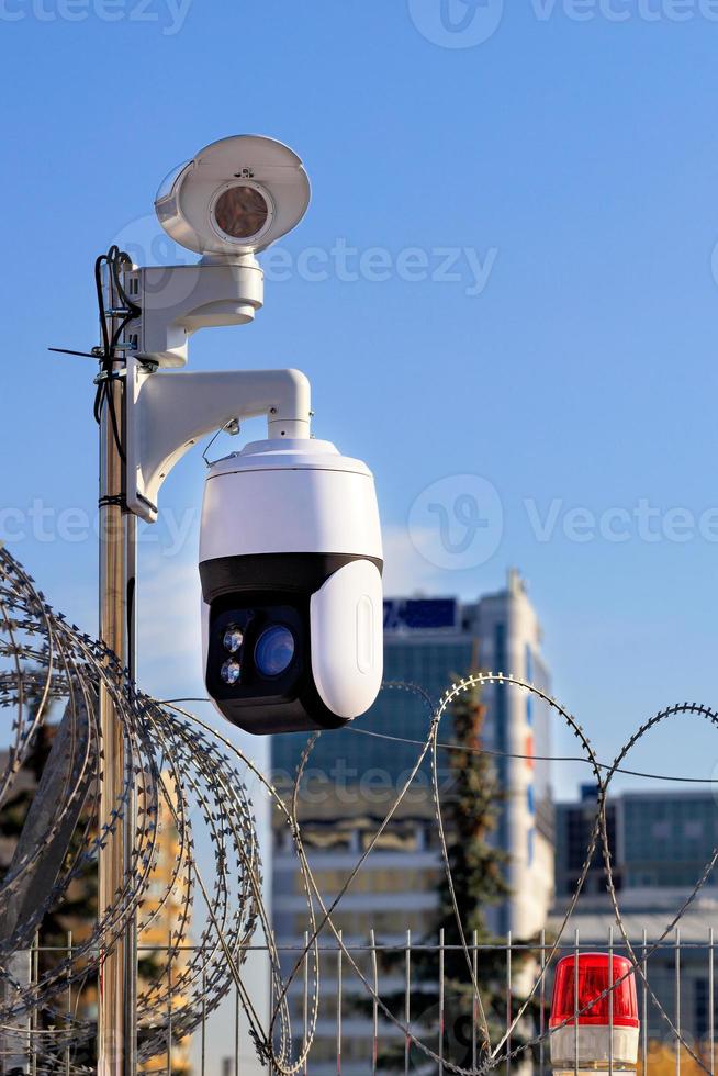Video cameras with motion sensors in a modern security system for monitoring the state of the border of the territory in urban conditions. photo