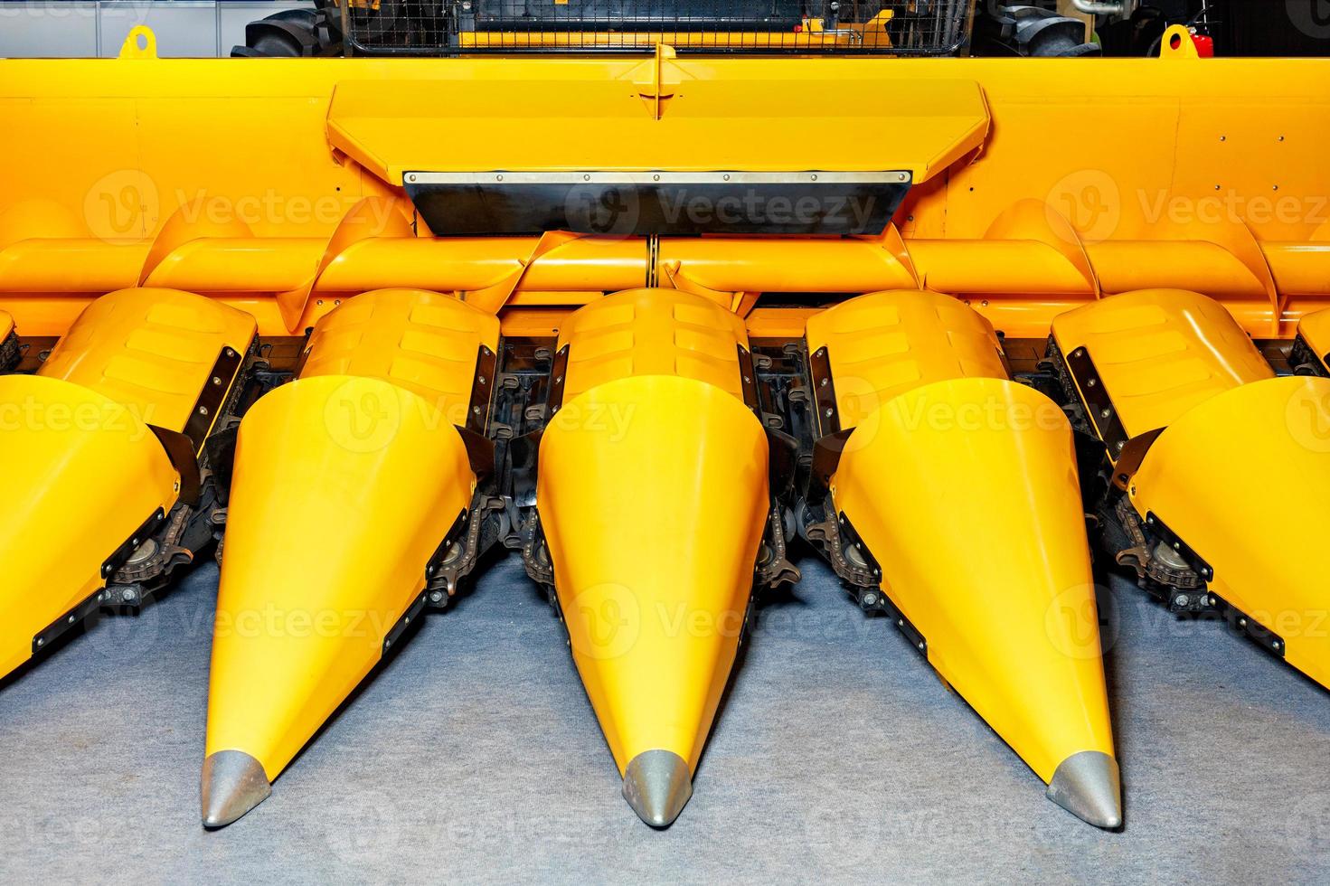 Close-up of the front of a corn harvester. photo