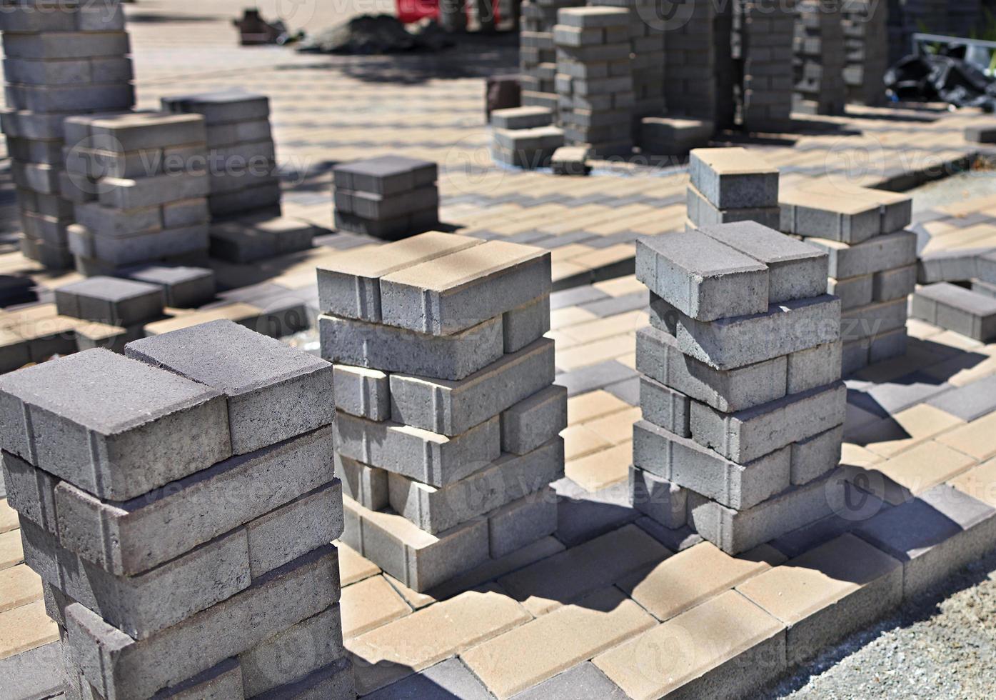 Stack of paving stones on construction site photo