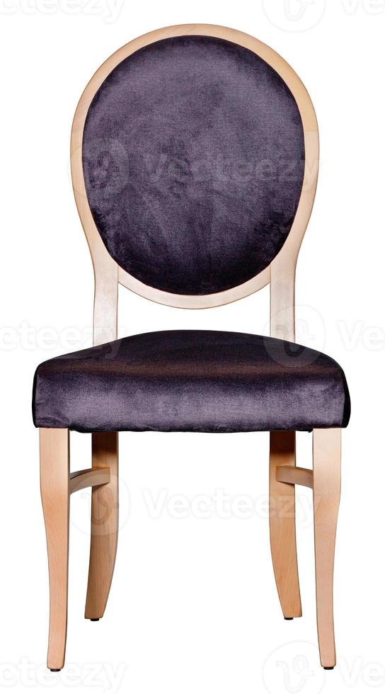 Wooden chair with a soft saddle and a round back isolated on a white background. photo