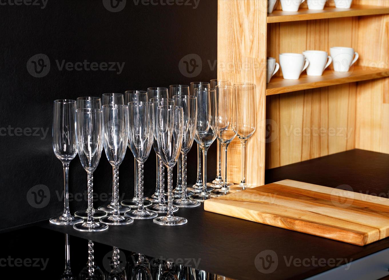 Glass transparent champagne glasses and coffee cups. photo