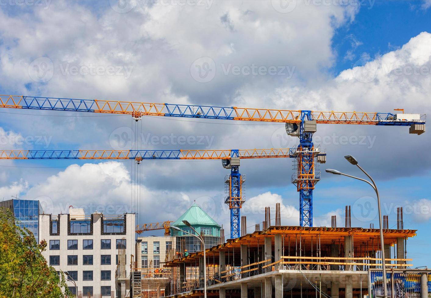 Construction of a multi-storey building using the modern method of monolithic frame technology. photo