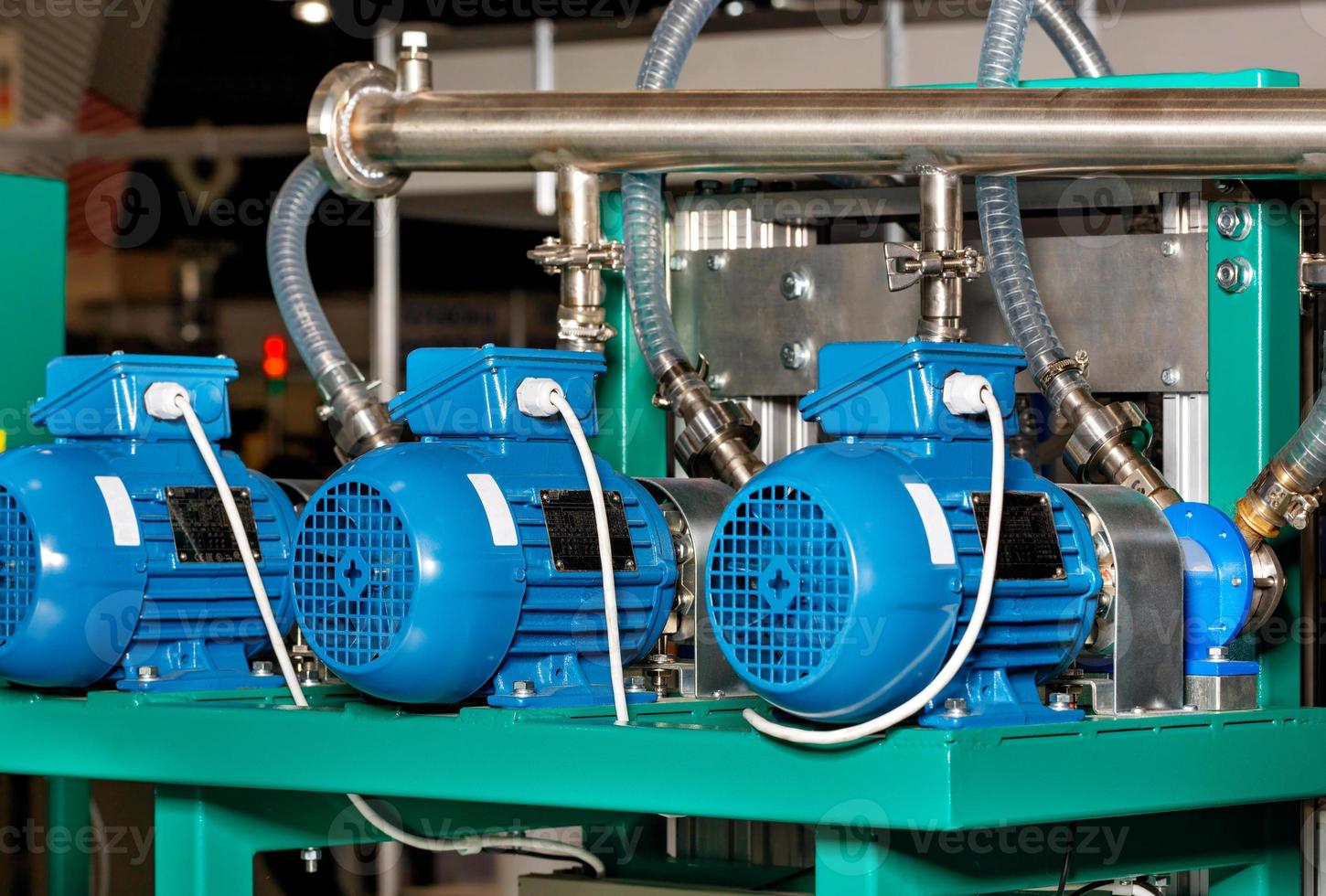 Electric motors in a production line to generate air pressure in a pipeline. photo