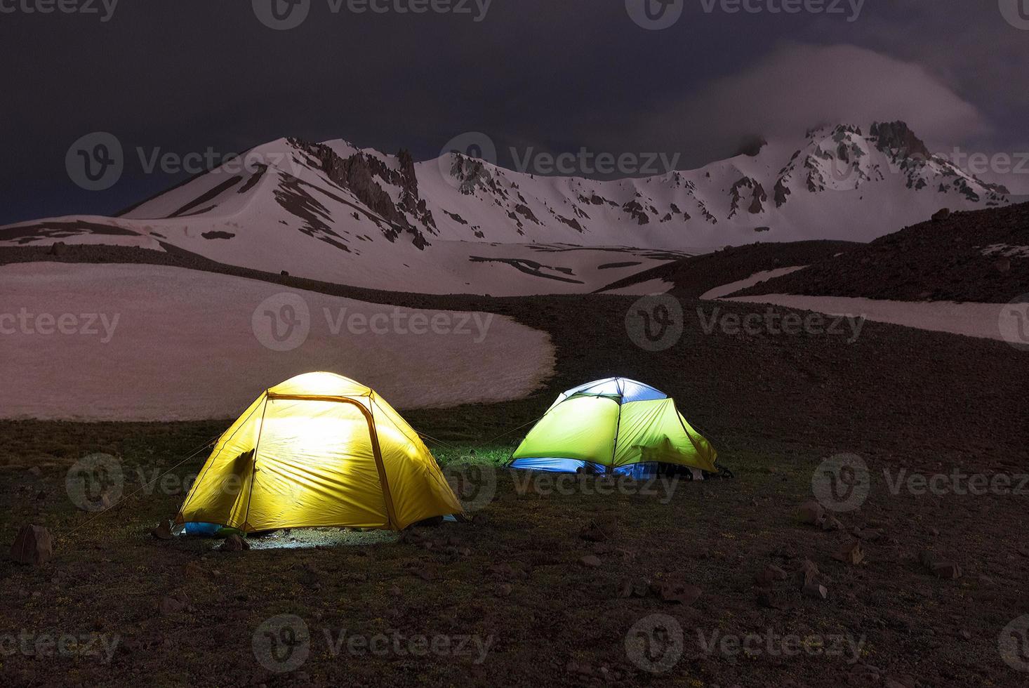 Tents of tourists are located at the foot of Mount Erciyes in central Turkey photo