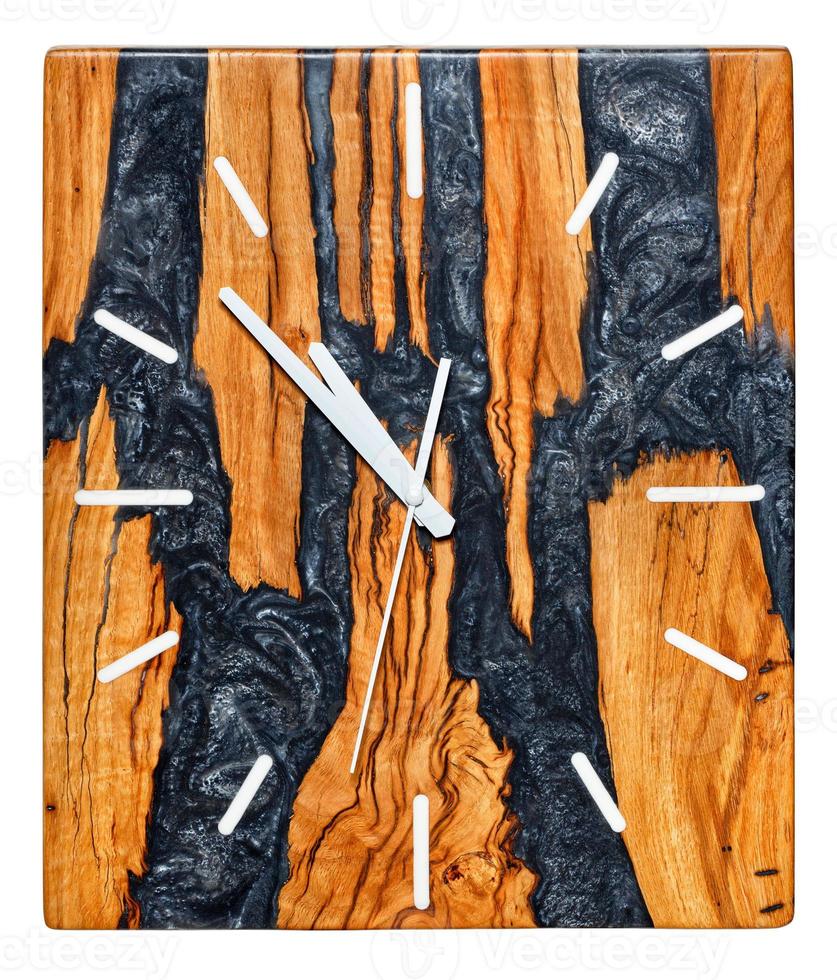 Beautiful rectangular wall clock made of a cut of a tree root and epoxy resin with an imitation of solidified lava of a volcano, isolated on a white background. photo