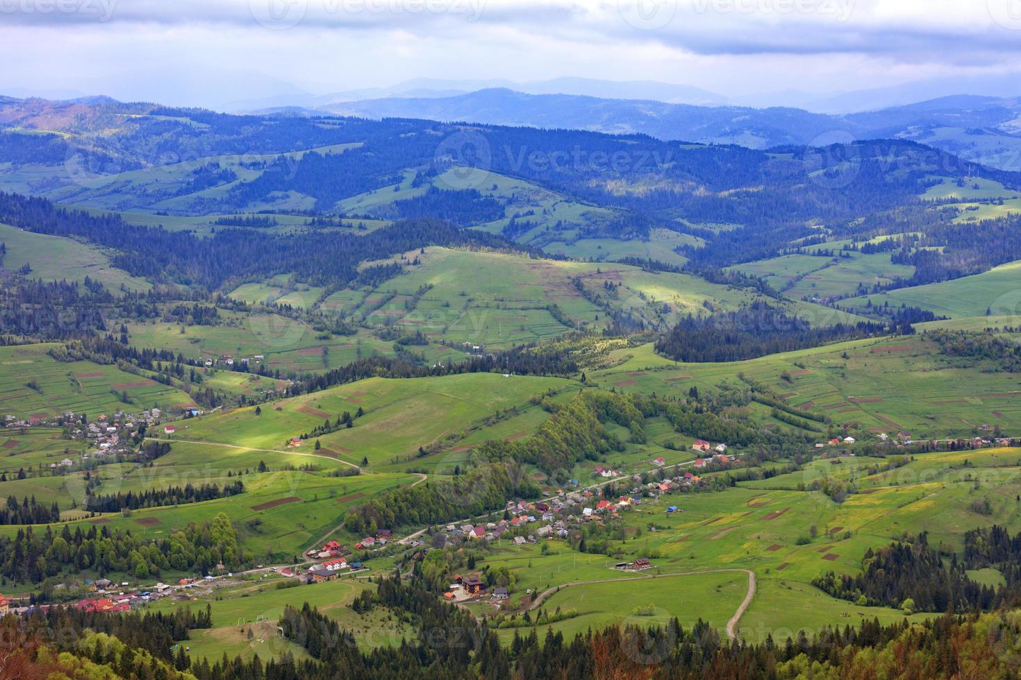 Beautiful landscape of the Carpathian mountains, Ukraine. View of the village from the top of the mountain. photo