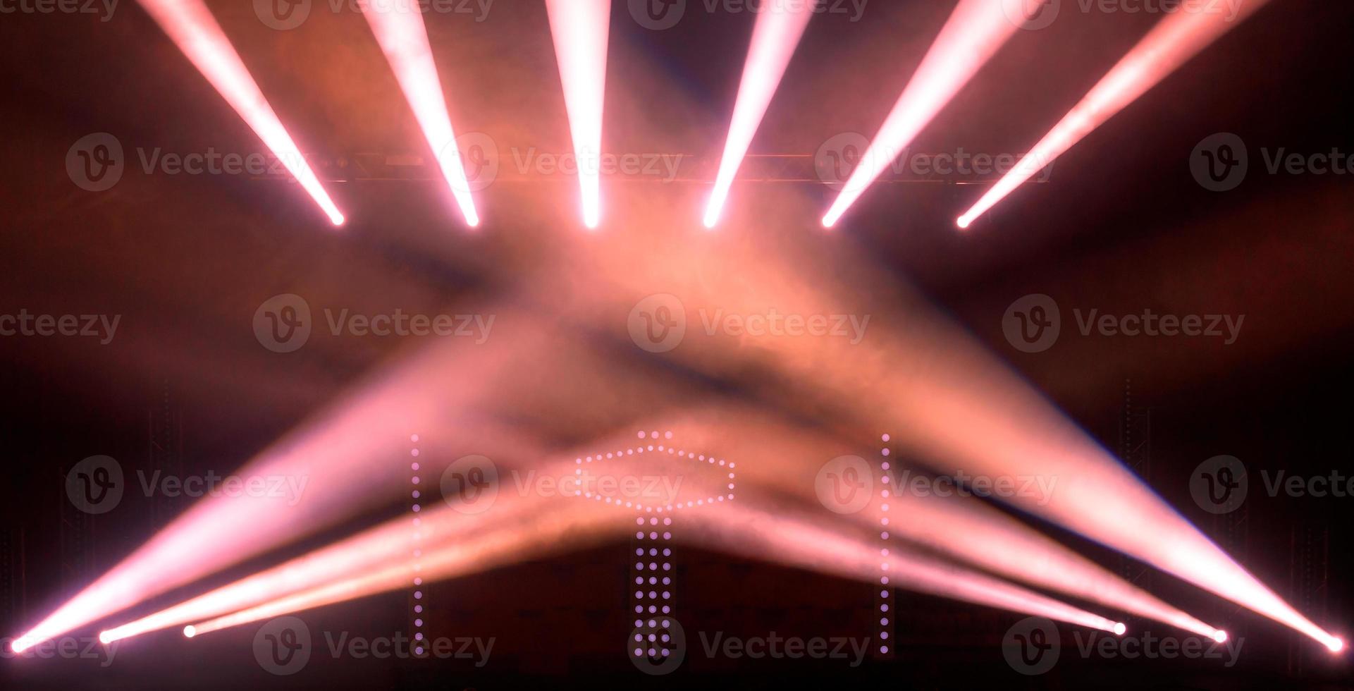 Theatrical stage with red spotlights. Presentation. Movie. photo