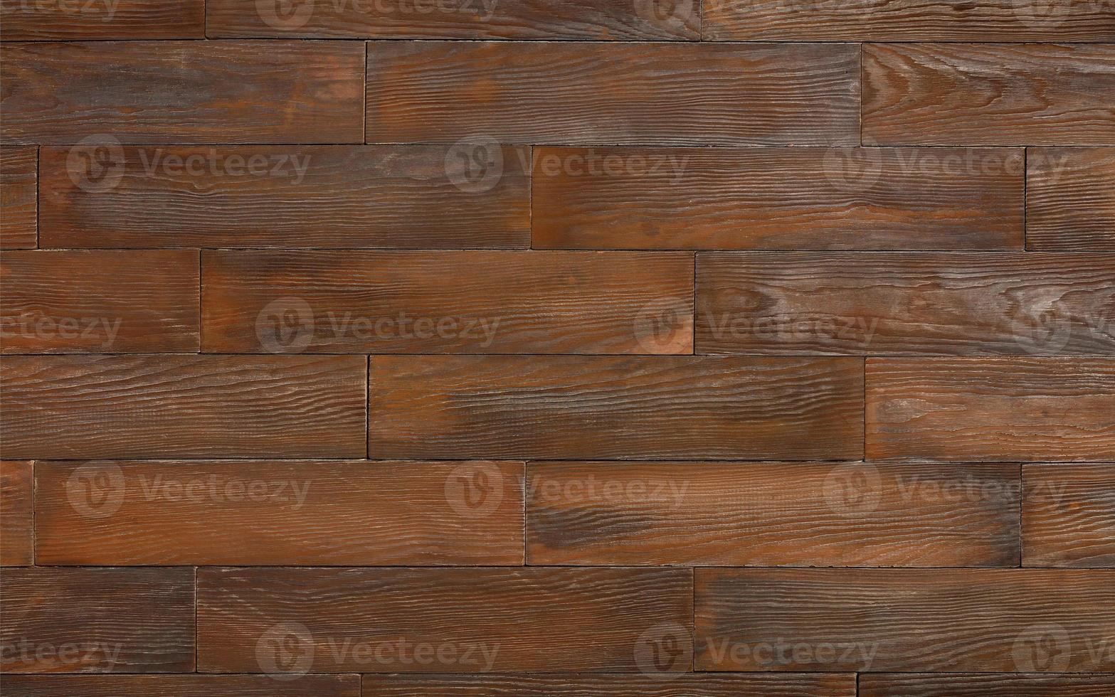 Beautiful wall made of dark brown wood planks, natural texture and background. photo