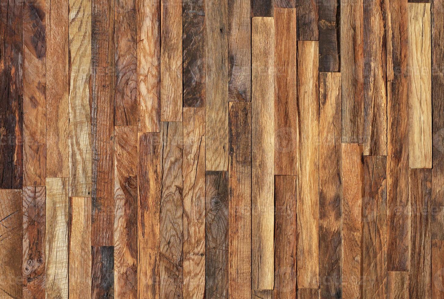 Pattern. Wooden mosaic wall. Mosaic of old wooden slats. photo