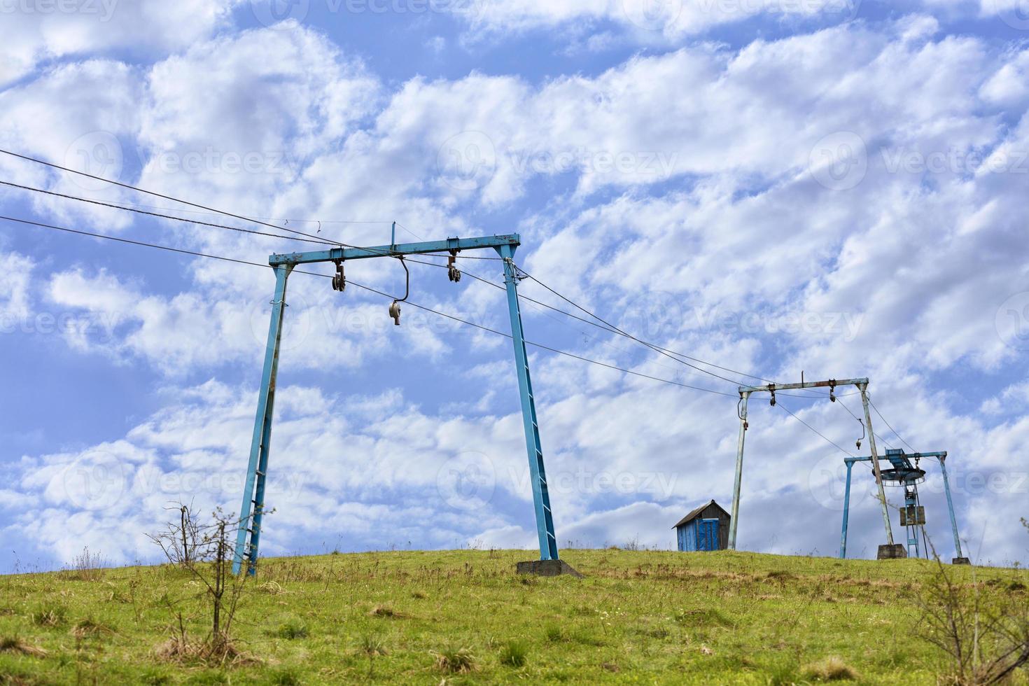 The framework of the mountain cable lift stand alone on the top of the mountain. photo