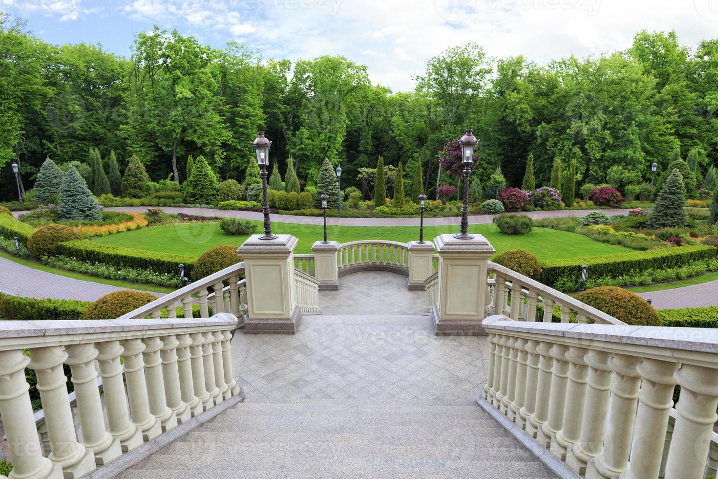 Beautiful granite staircase with a balustrade photo