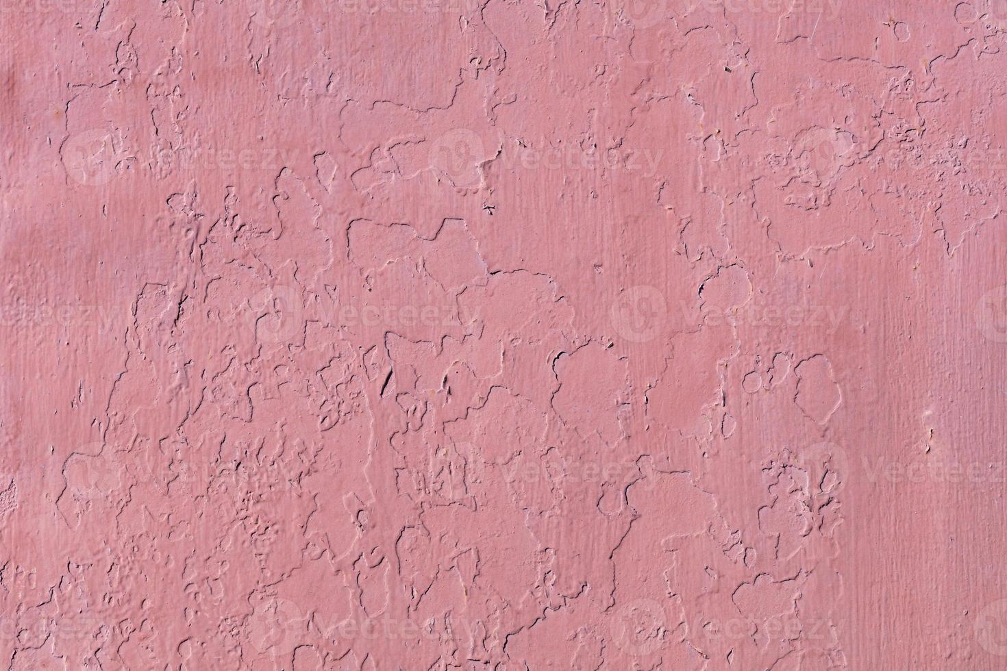 Texture and background of the old wall, which is painted with red paint. photo