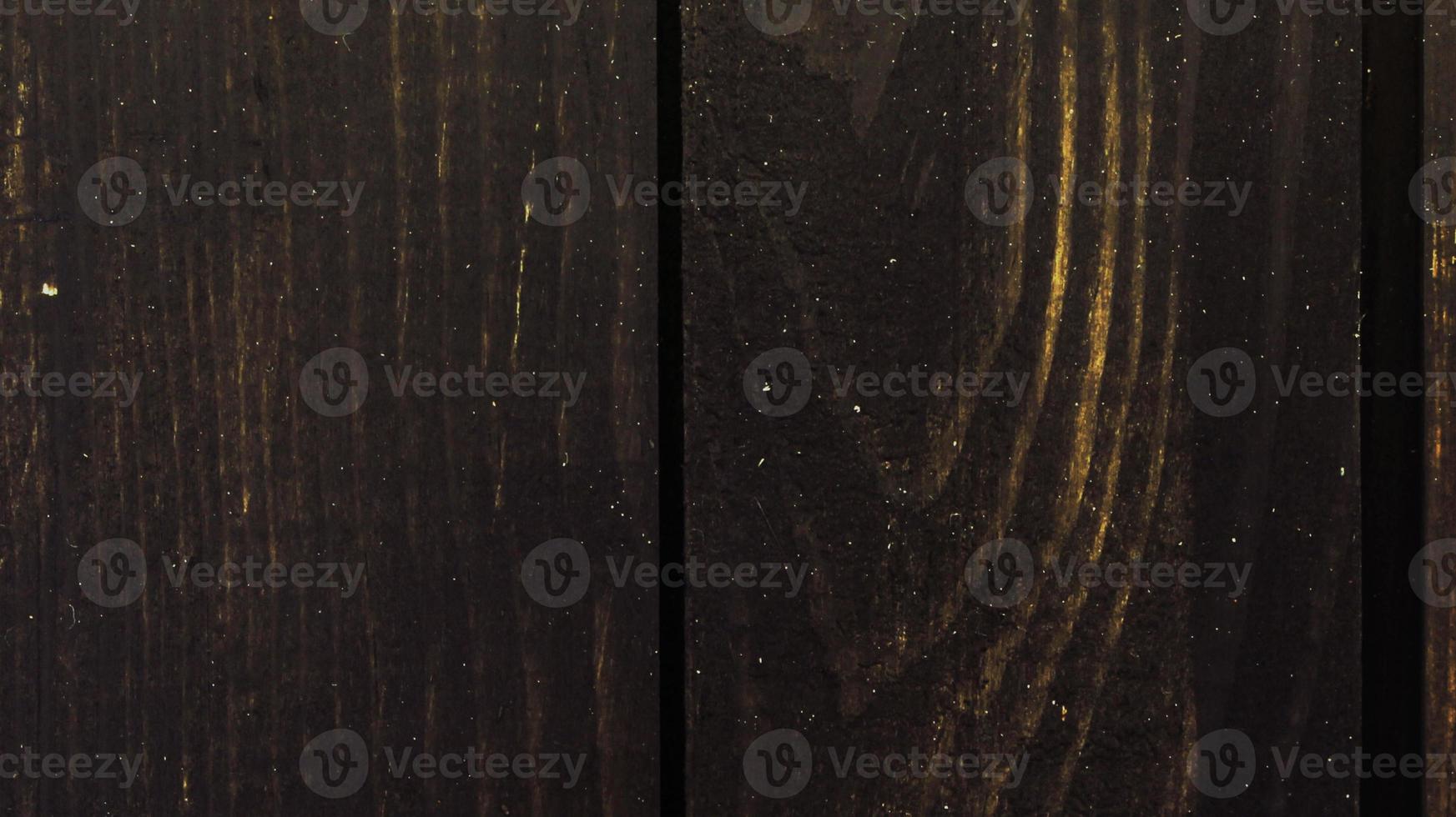 Wooden black color background and texture of a wooden wall made of boards. Modern solutions for advanced design photo